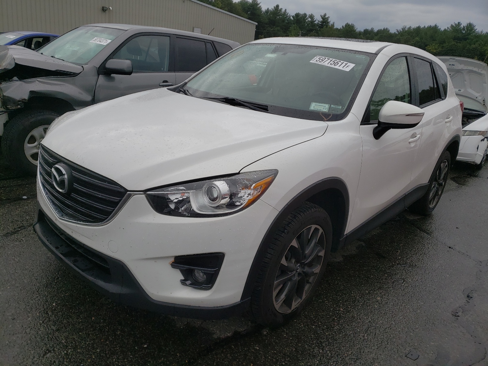 Photo 2 from auction – 2016 MAZDA CX-5 GT with VIN JM3KE4DY0G0691131