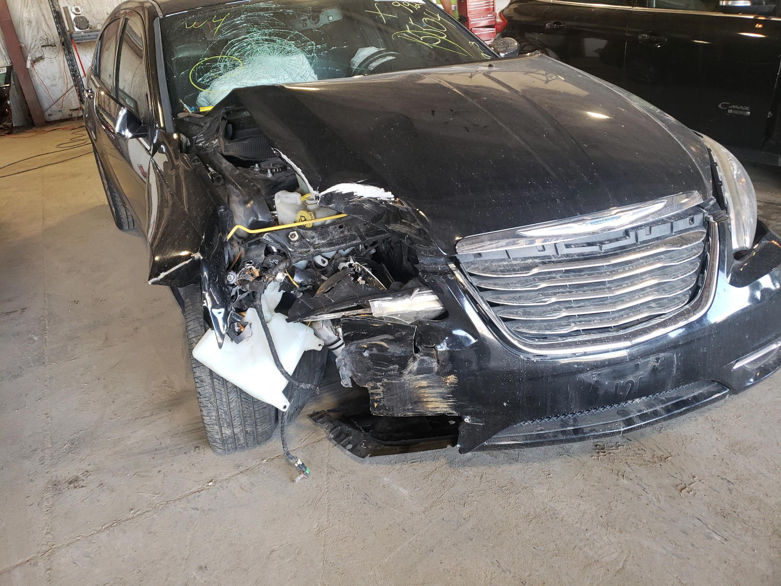 Photo 9 from auction – 2011 CHRYSLER 200 LIMITE with VIN 1C3BC2FBXBN579920