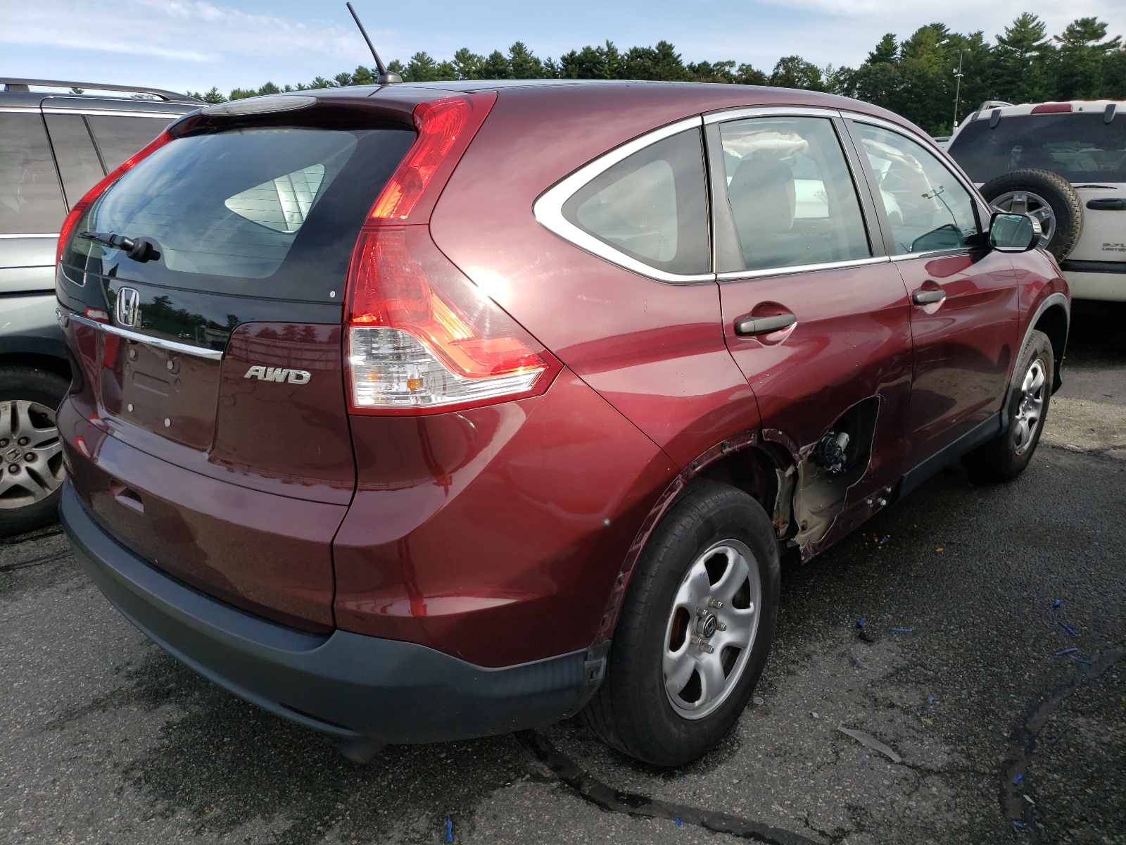 Photo 4 from auction – 2014 HONDA CR-V LX with VIN 5J6RM4H32EL095436