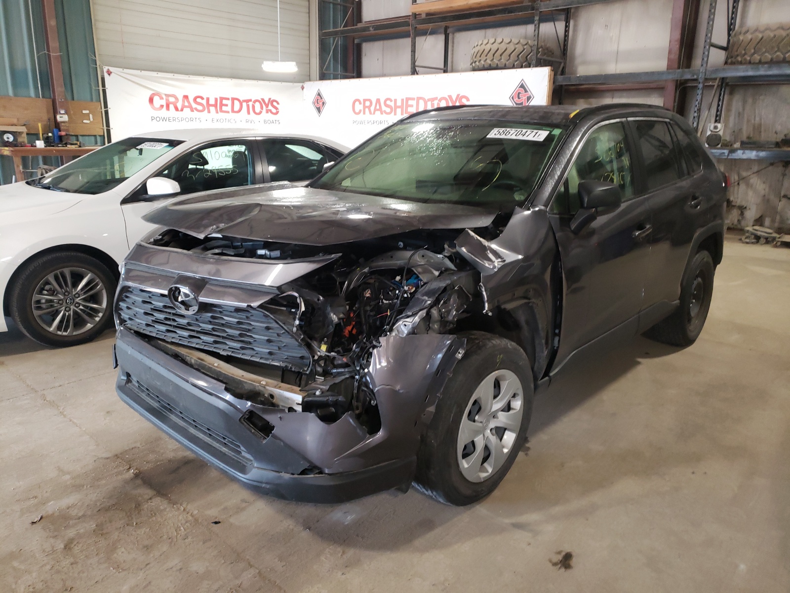 Photo 2 from auction – 2019 TOYOTA RAV4 LE with VIN JTMF1RFVXKJ015701