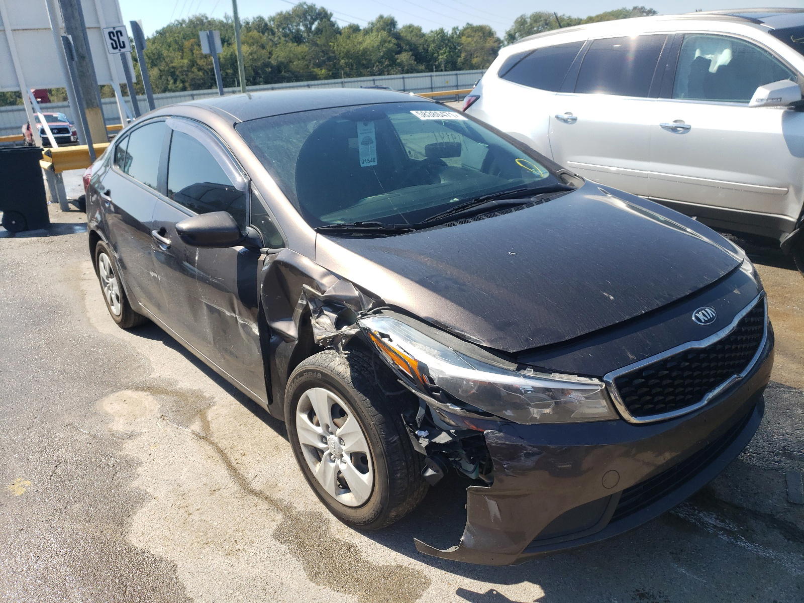 KIA FORTE LX 2017 with VIN 3KPFK4A79HE068940 - Photo from auction