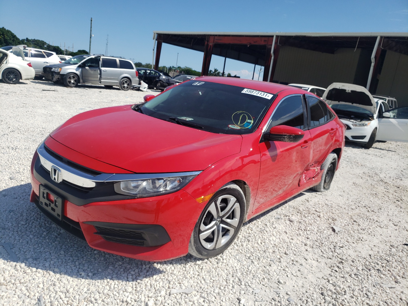 Photo 2 from auction – 2017 HONDA CIVIC LX with VIN 2HGFC2F50HH546483