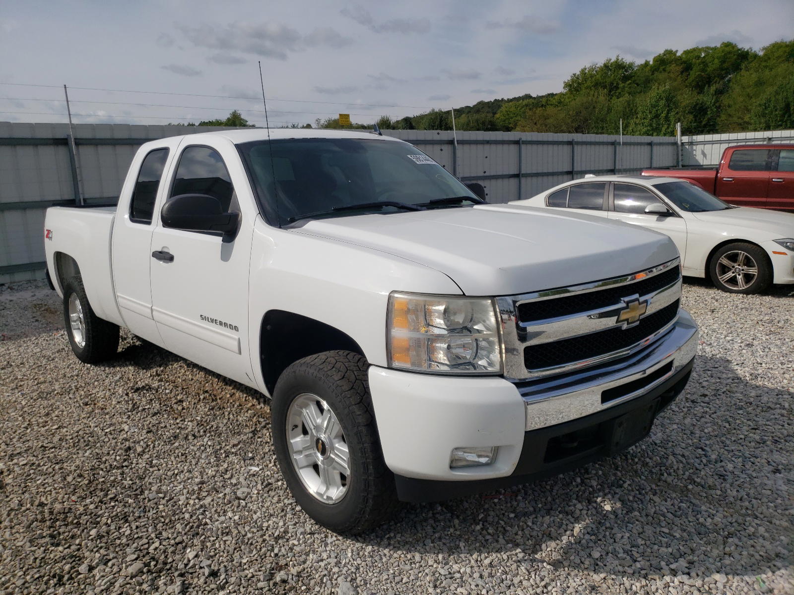 CHEVROLET SILVERADO 2011 with VIN 1GCRKSE33BZ460185 - Photo from auction