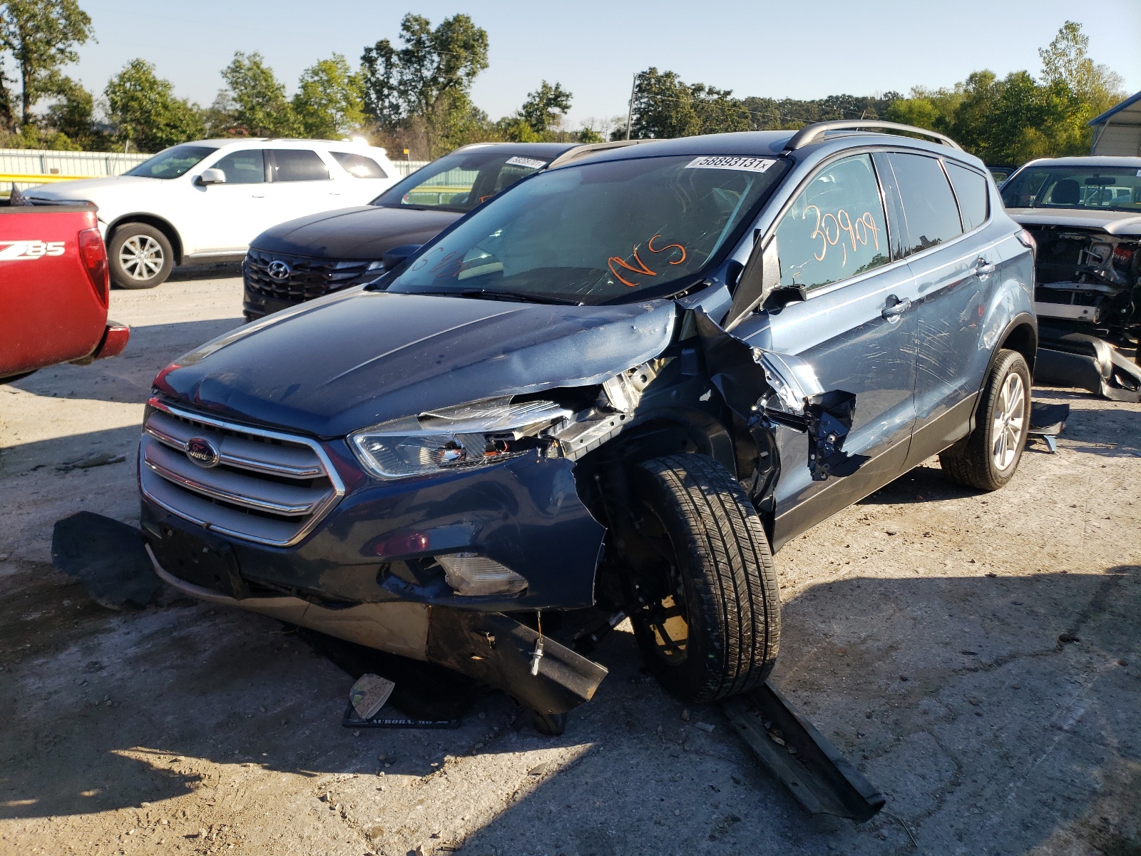Photo 2 from auction – 2018 FORD ESCAPE SE with VIN 1FMCU9GD9JUA64168