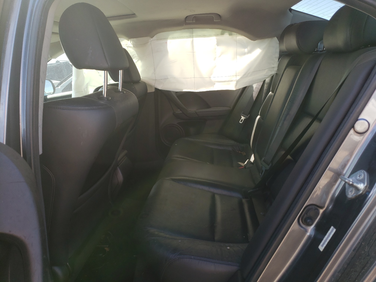 Photo 6 from auction – 2010 ACURA TSX with VIN JH4CU2F65AC038329