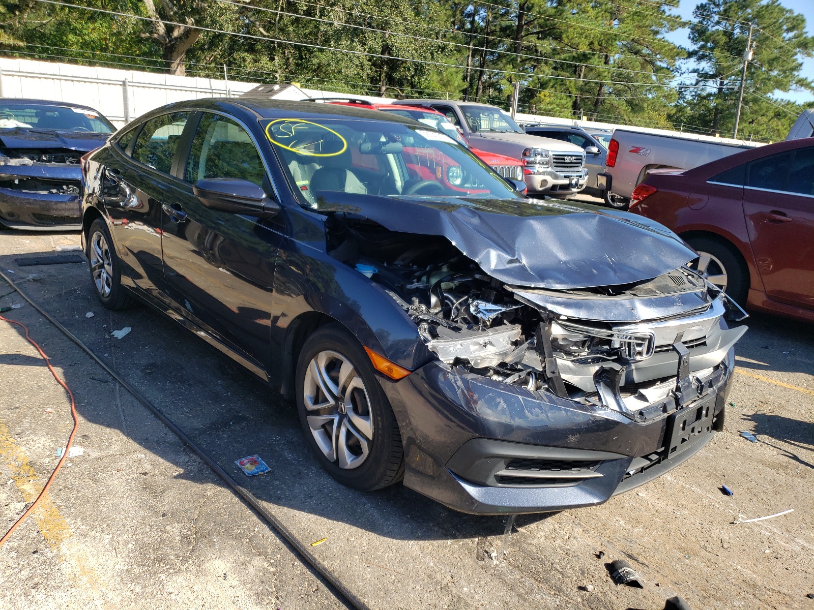 HONDA CIVIC LX 2017 with VIN 2HGFC2F52HH509533 - Photo from auction