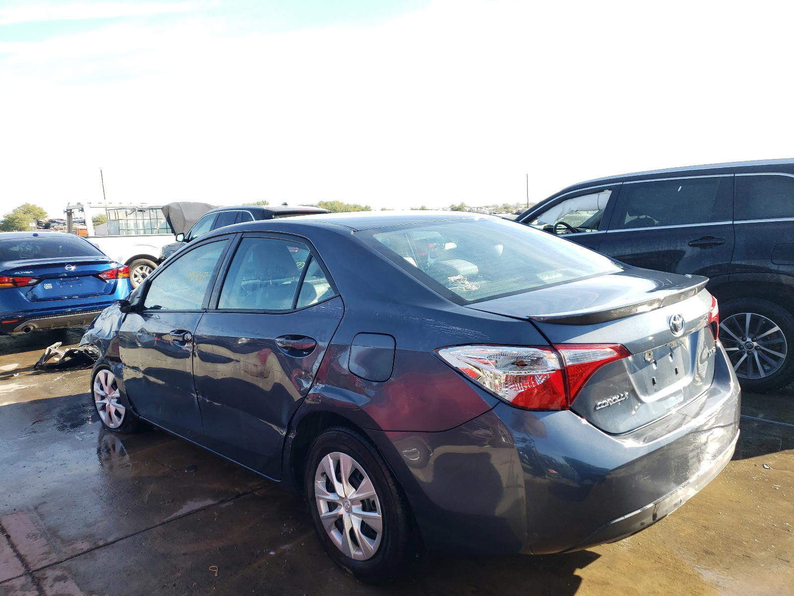 Photo 3 from auction – 2014 TOYOTA COROLLA EC with VIN 5YFBPRHE6EP119189