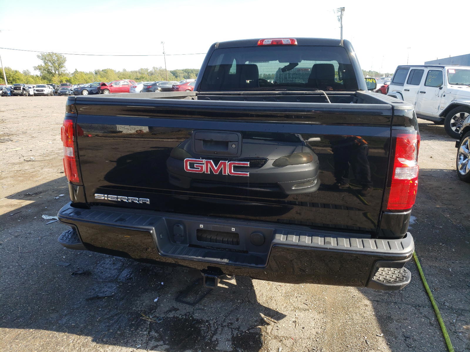 Photo 6 from auction – 2015 GMC SIERRA K15 with VIN 1GTV2TEC6FZ332663