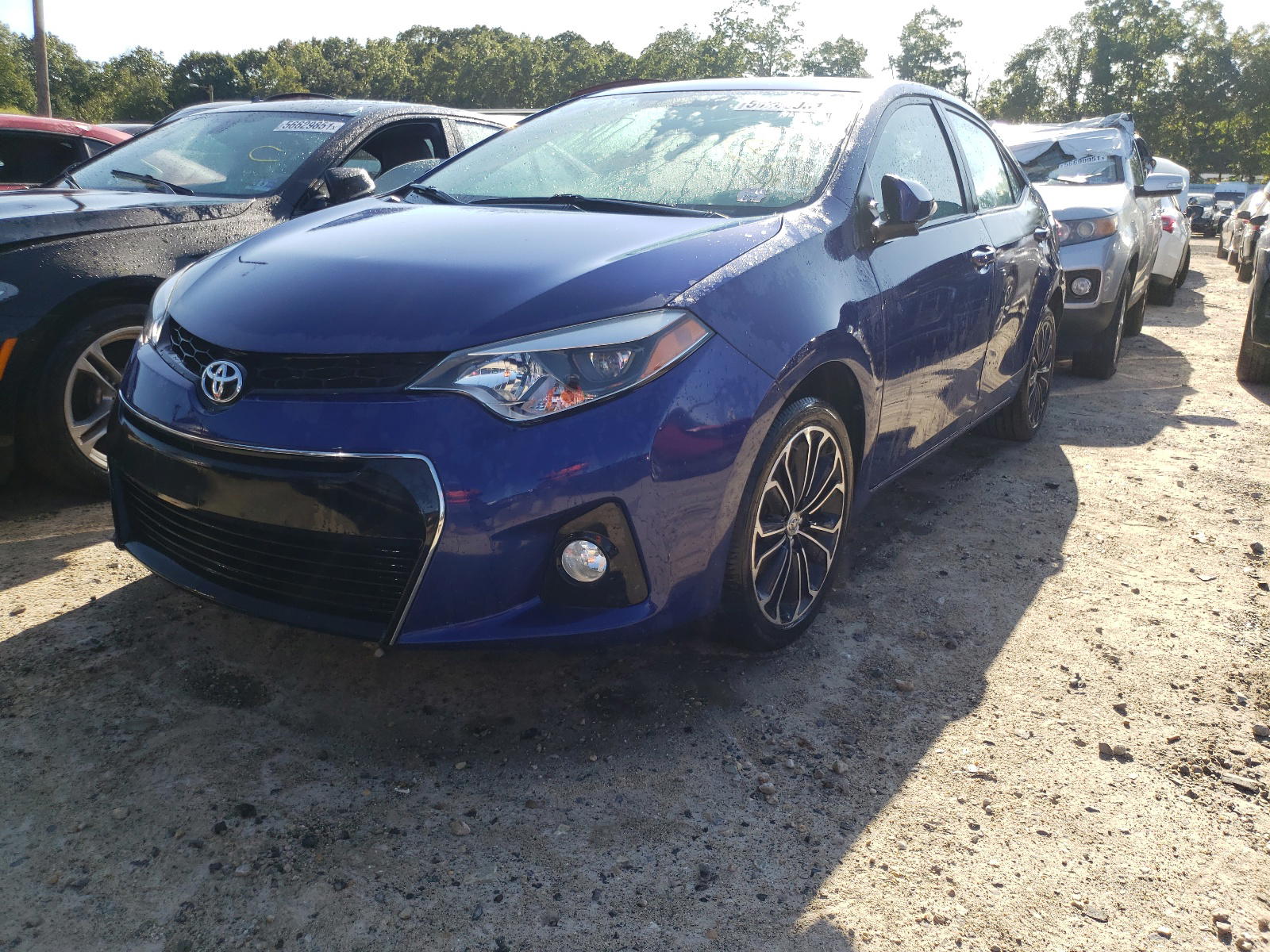 Photo 2 from auction – 2014 TOYOTA COROLLA L with VIN 2T1BURHEXEC125649