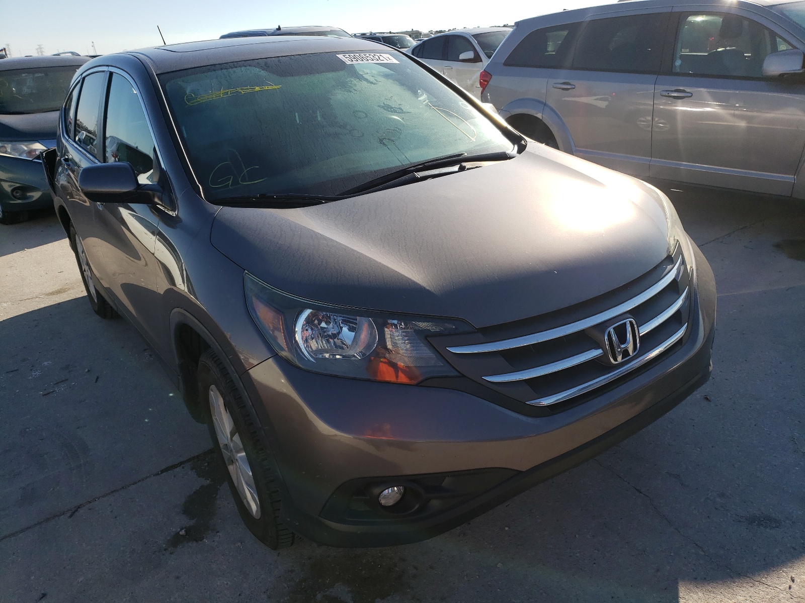 HONDA CR-V EX 2014 with VIN 3CZRM3H52EG702895 - Photo from auction