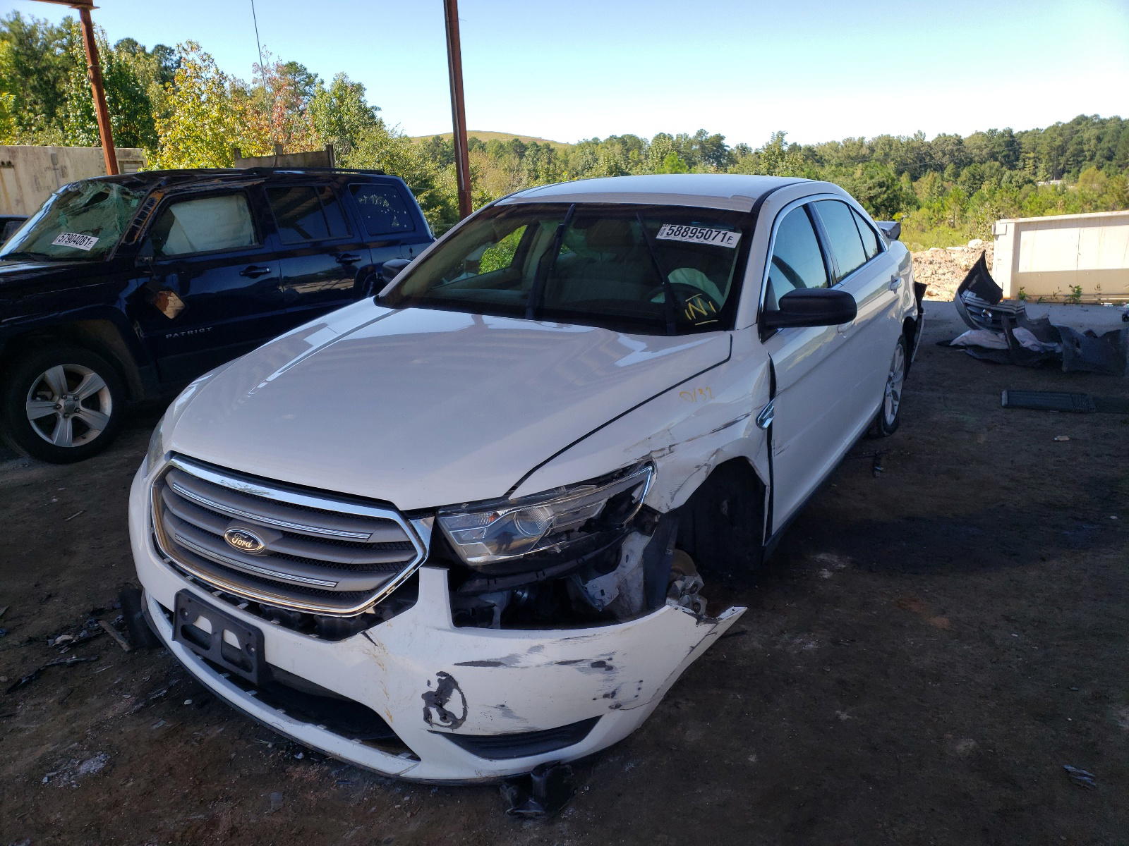 Photo 2 from auction – 2013 FORD TAURUS SE with VIN 1FAHP2D86DG208378
