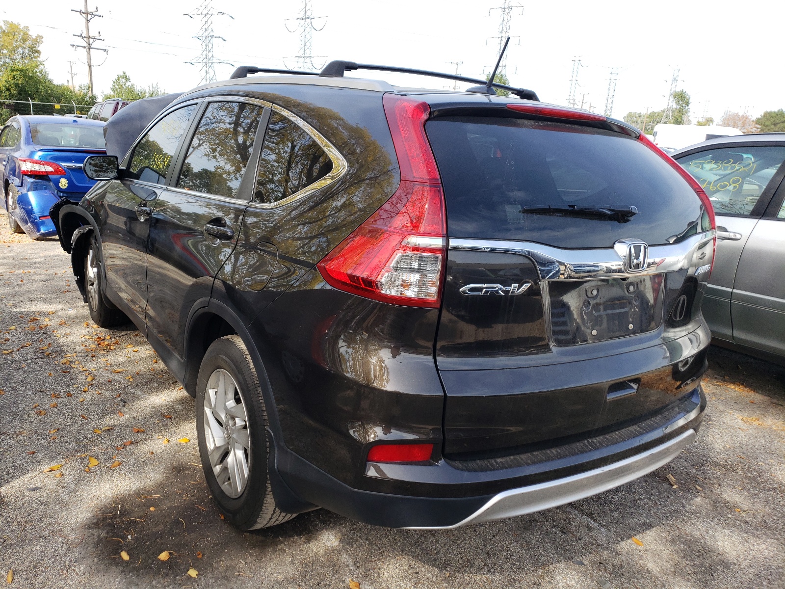 Photo 3 from auction – 2016 HONDA CR-V EXL with VIN 5J6RM4H71GL112376