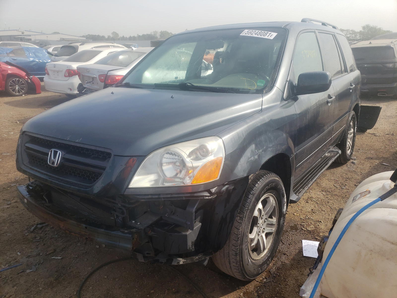 Photo 2 from auction – 2003 HONDA PILOT EXL with VIN 2HKYF18573H523725