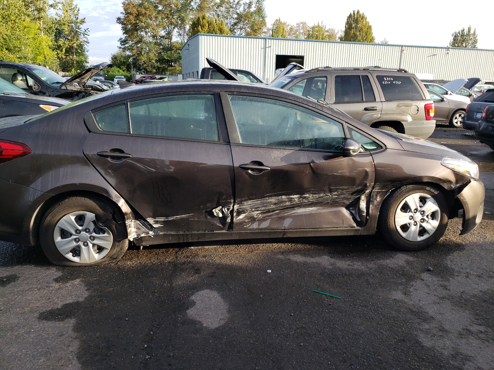 Photo 9 from auction – 2017 KIA FORTE LX with VIN 3KPFL4A79HE107054