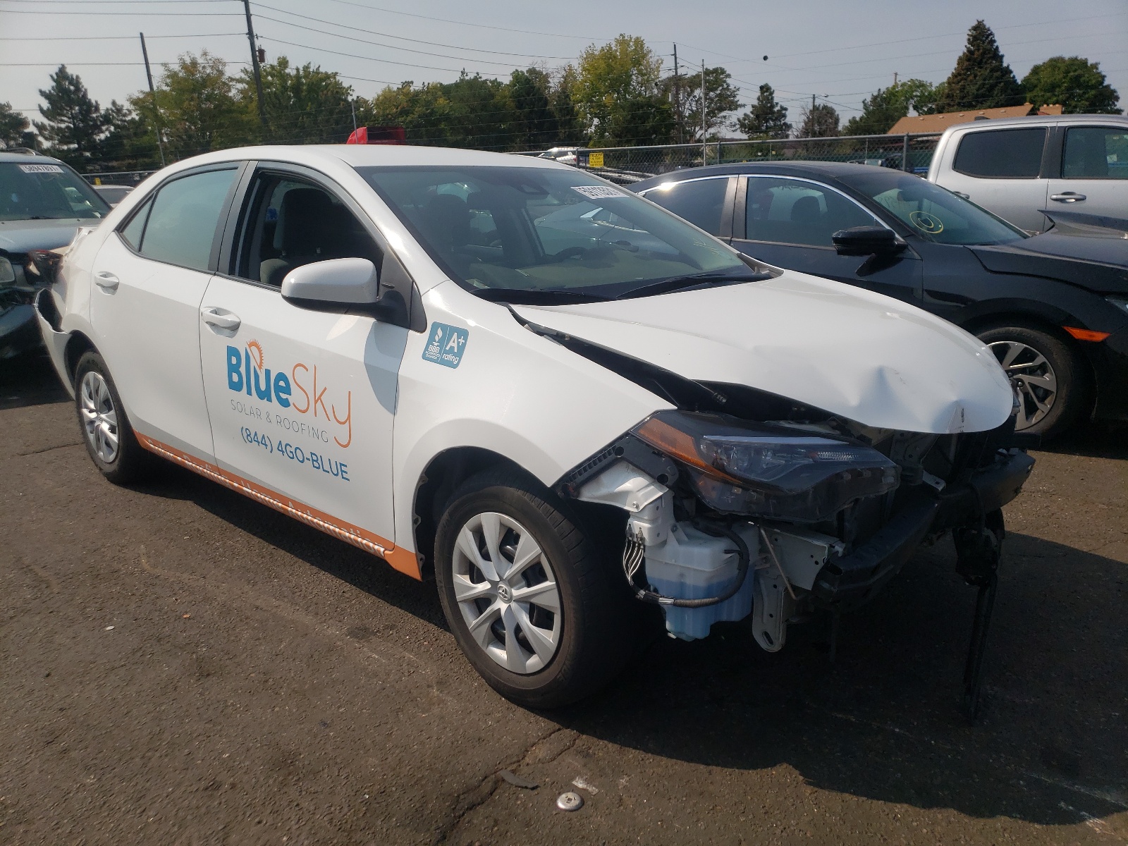 TOYOTA COROLLA L 2019 with VIN 5YFBURHE8KP863056 - Photo from auction