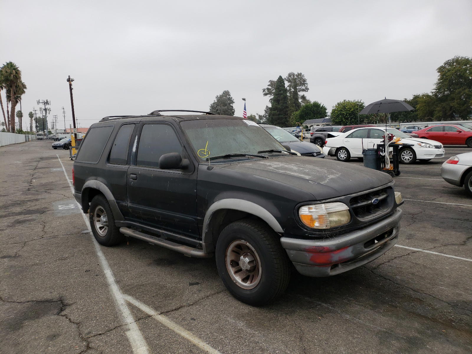 FORD EXPLORER 1998 with VIN 1FMYU22E0WUB88799 - Photo from auction