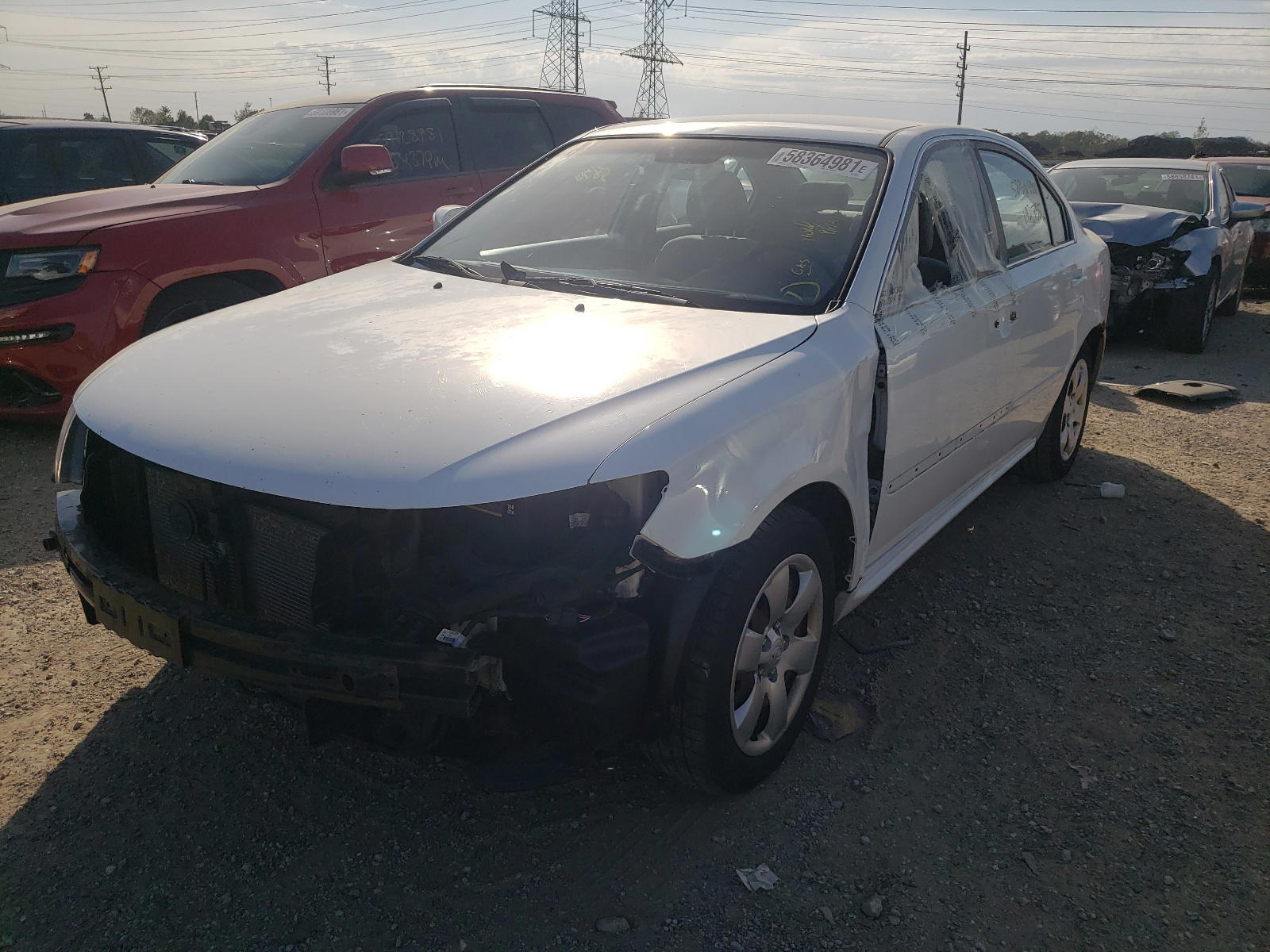 Photo 2 from auction – 2009 KIA OPTIMA LX with VIN KNAGE228295356848