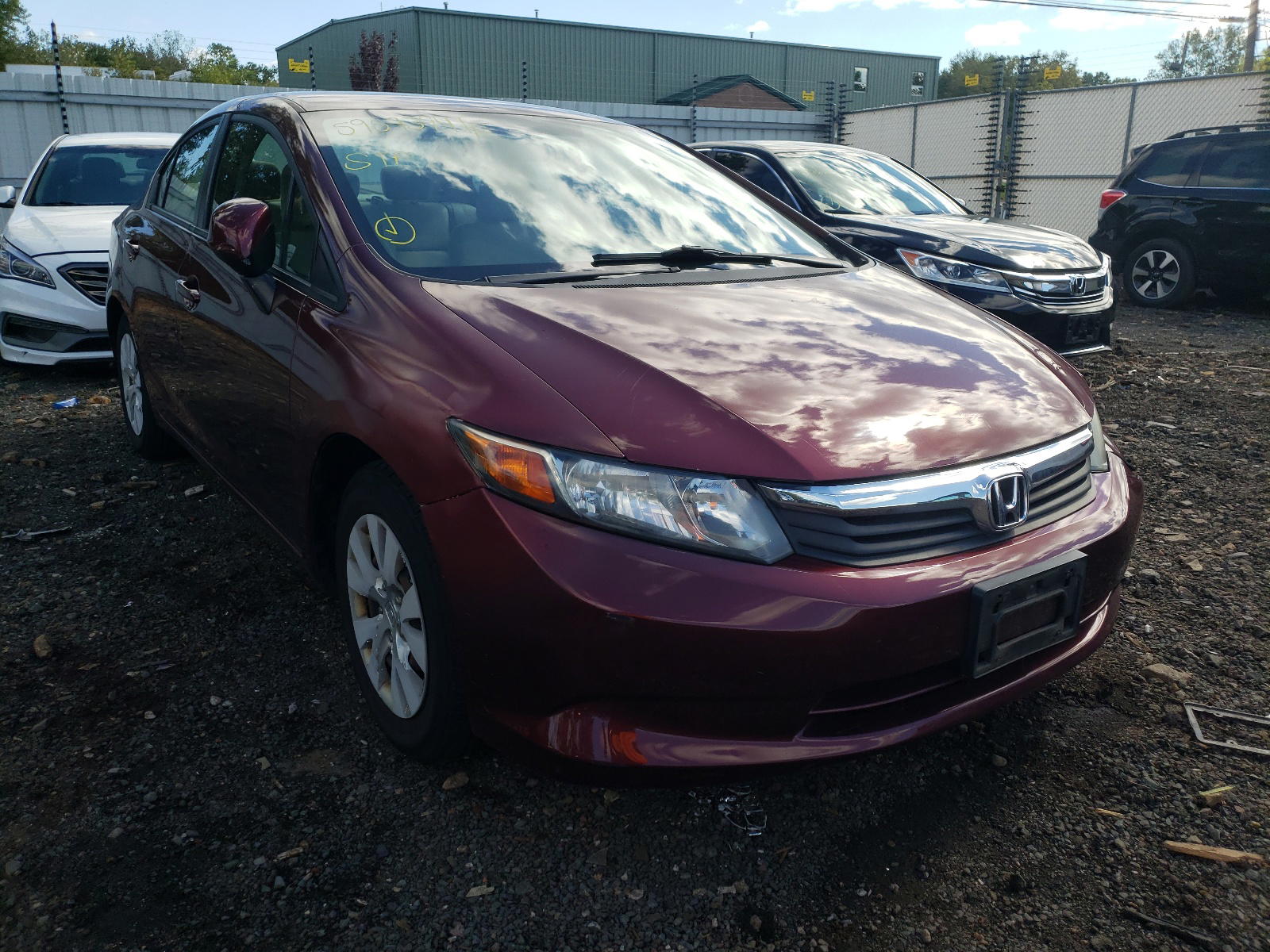 HONDA CIVIC LX 2012 with VIN 2HGFB2F52CH596216 - Photo from auction