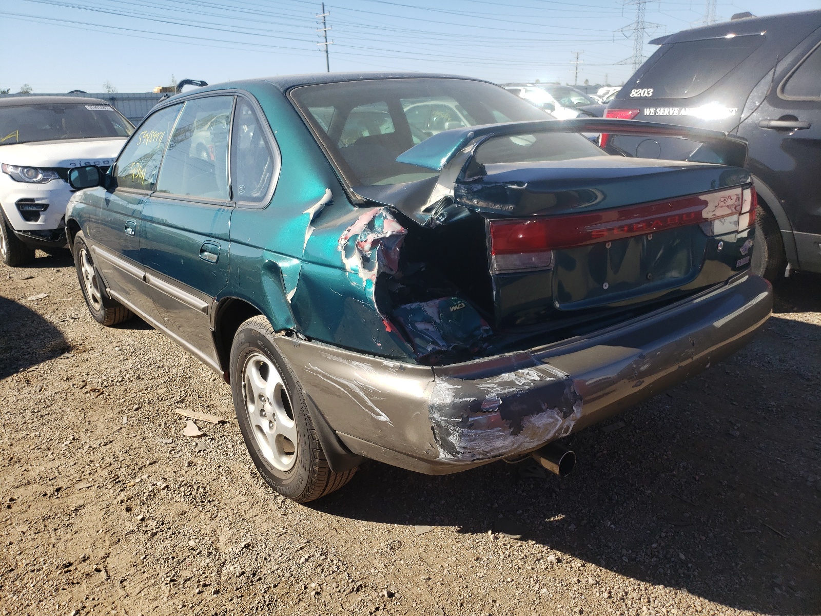 Photo 3 from auction – 1999 SUBARU LEGACY 30T with VIN 4S3BD6858X7240382