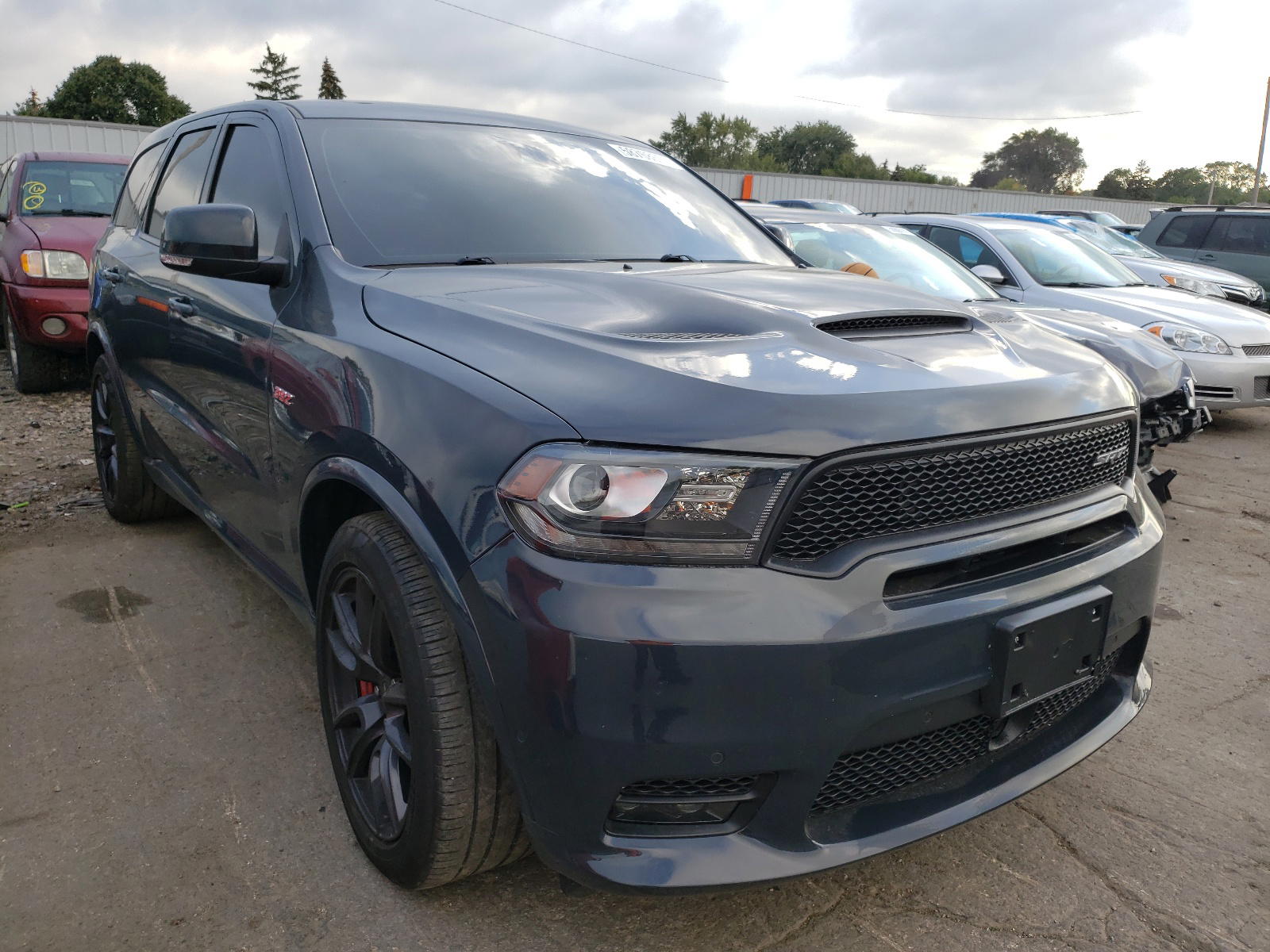 DODGE DURANGO SR 2018 with VIN 1C4SDJGJ2JC366625 - Photo from auction