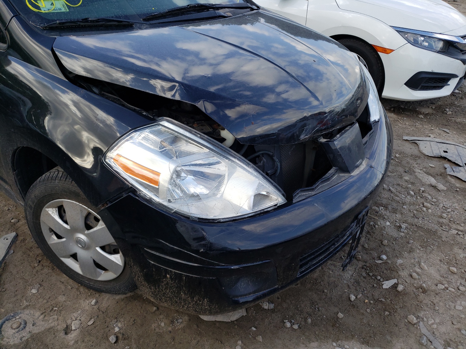 Photo 9 from auction – 2009 NISSAN VERSA S with VIN 3N1CC11E79L496745
