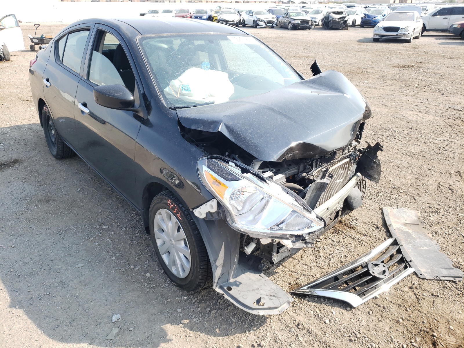 NISSAN VERSA S 2015 with VIN 3N1CN7AP4FL910347 - Photo from auction