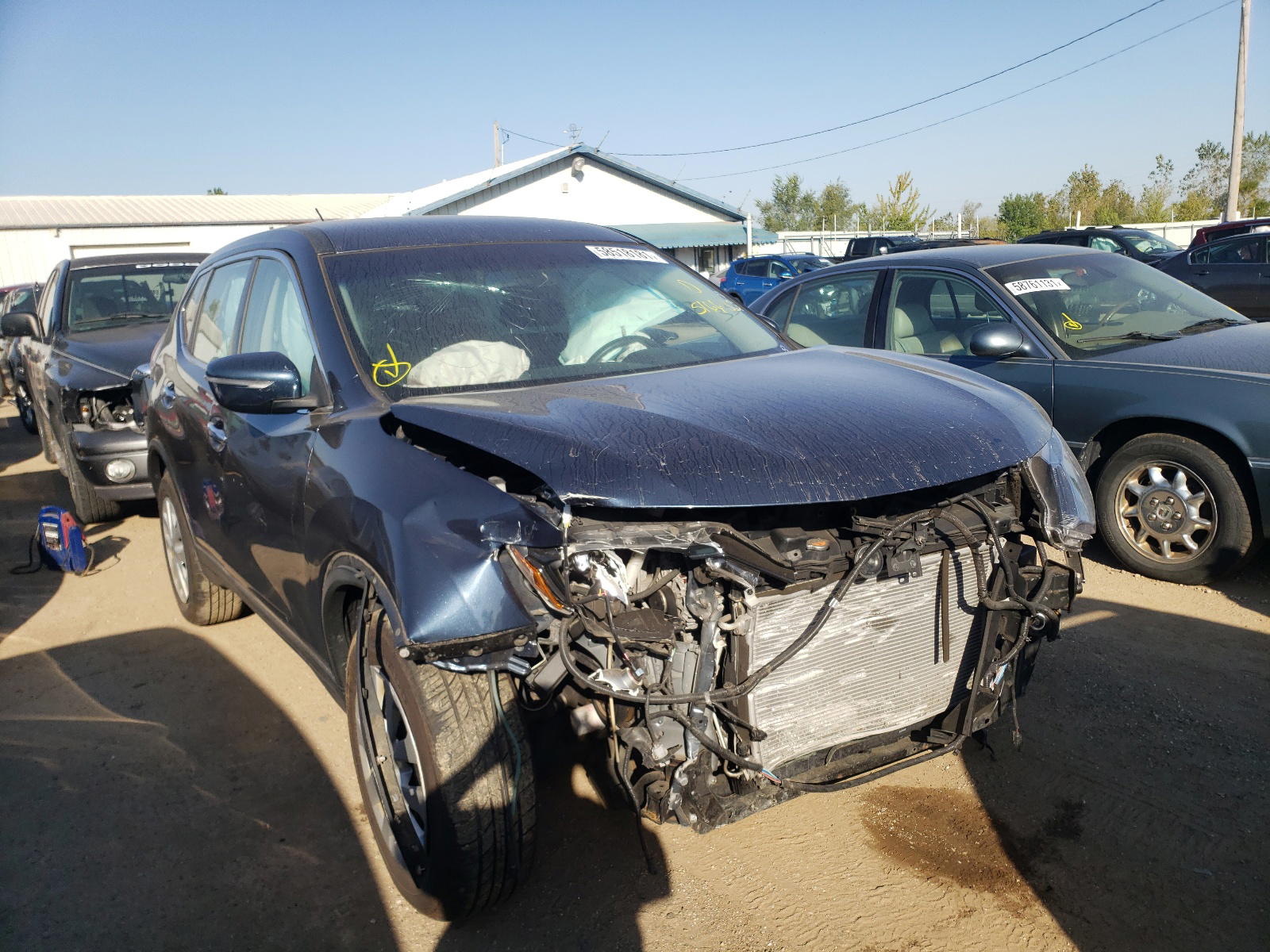 NISSAN ROGUE S 2015 with VIN KNMAT2MV6FP516635 - Photo from auction