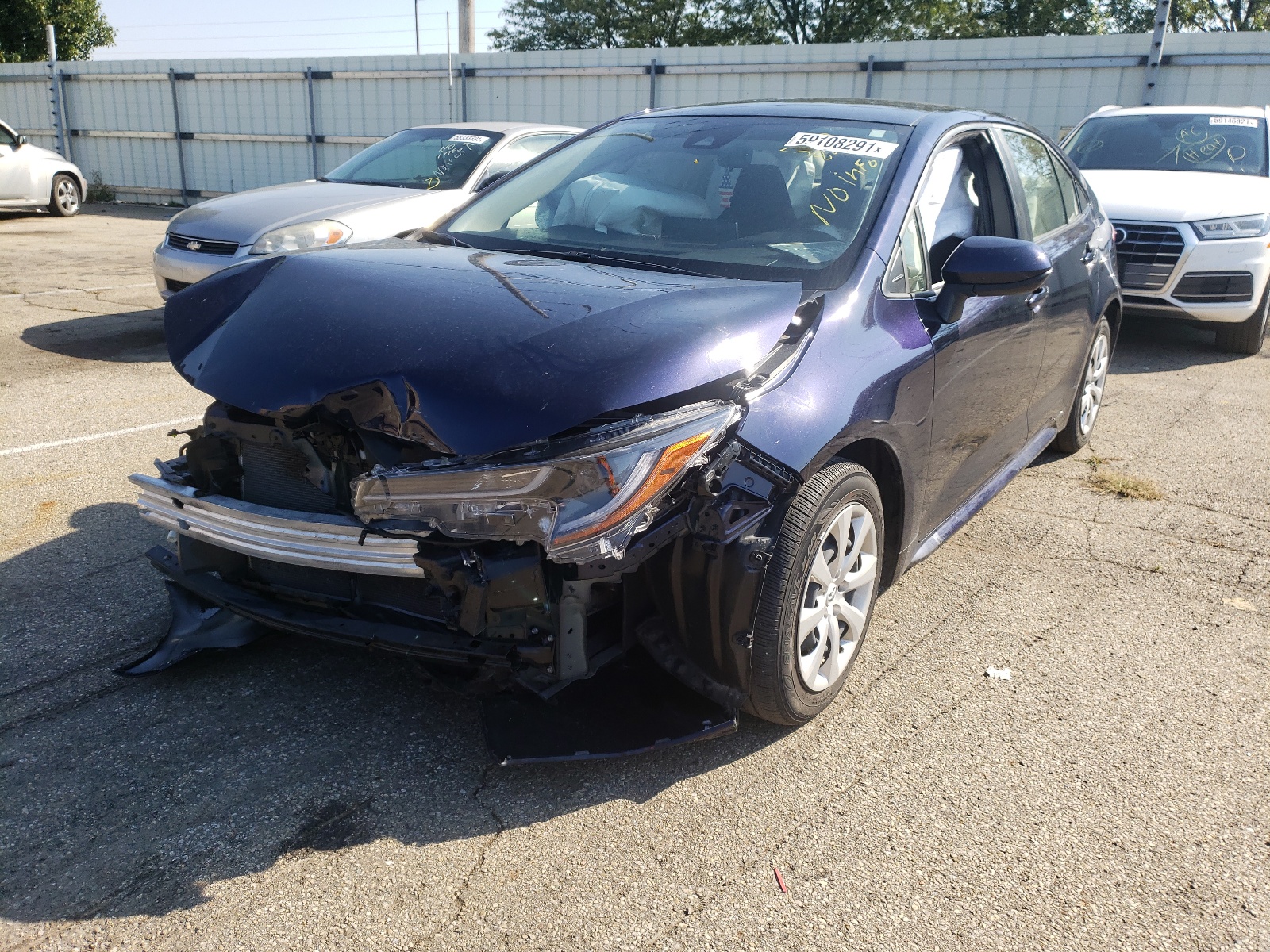 Photo 2 from auction – 2021 TOYOTA COROLLA LE with VIN JTDEPMAE4MJ141365