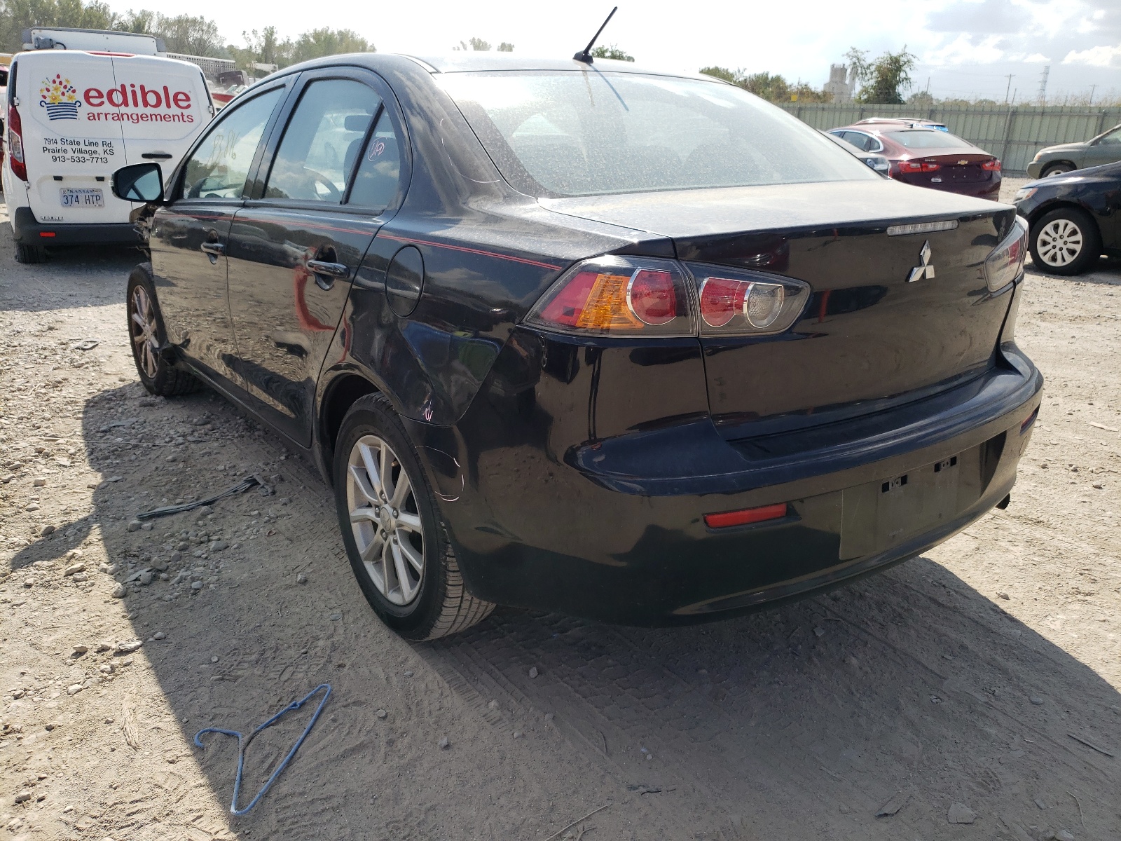 Photo 3 from auction – 2016 MITSUBISHI LANCER ES with VIN JA32U2FU0GU001170