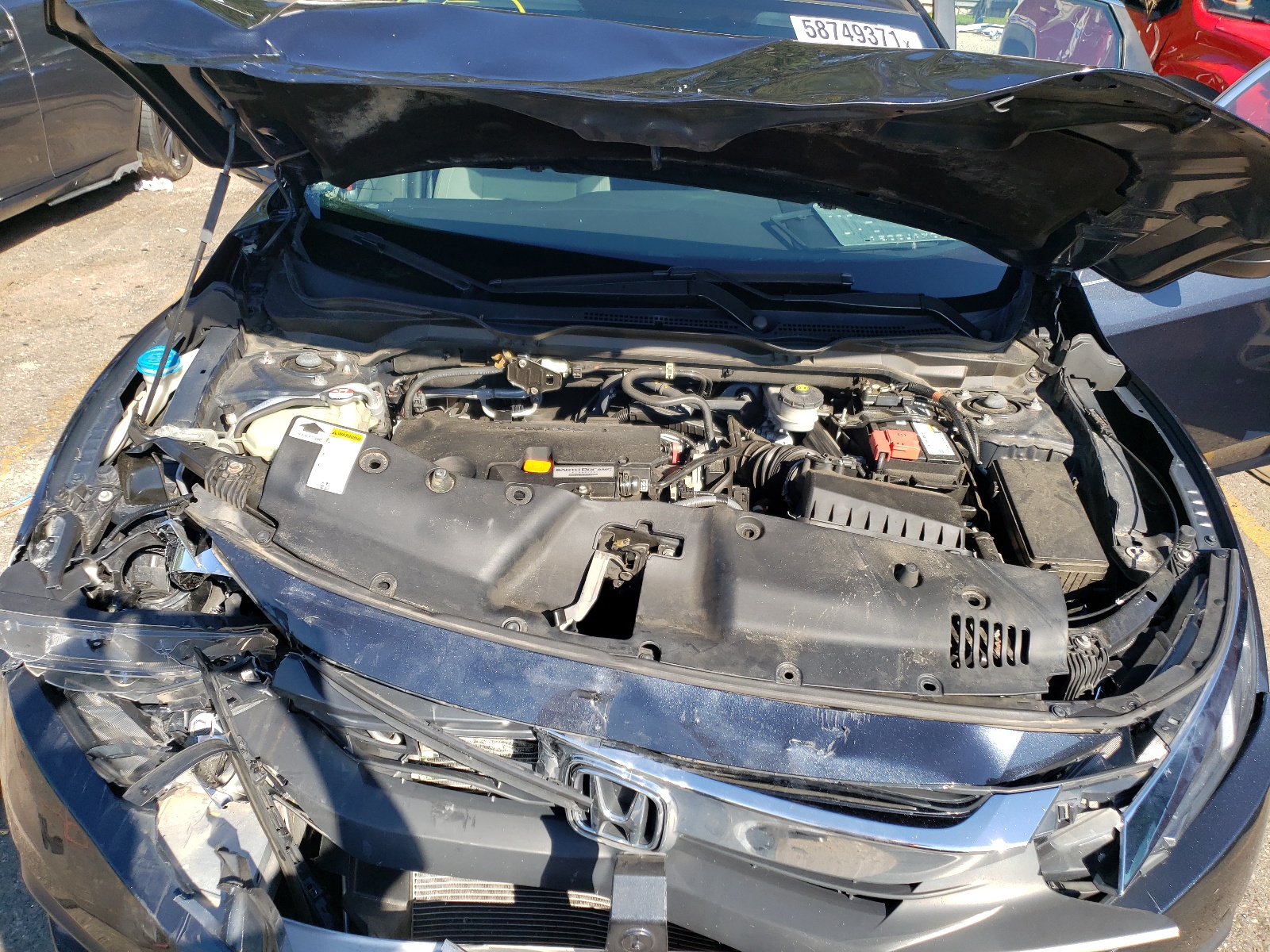 Photo 7 from auction – 2017 HONDA CIVIC LX with VIN 2HGFC2F52HH509533