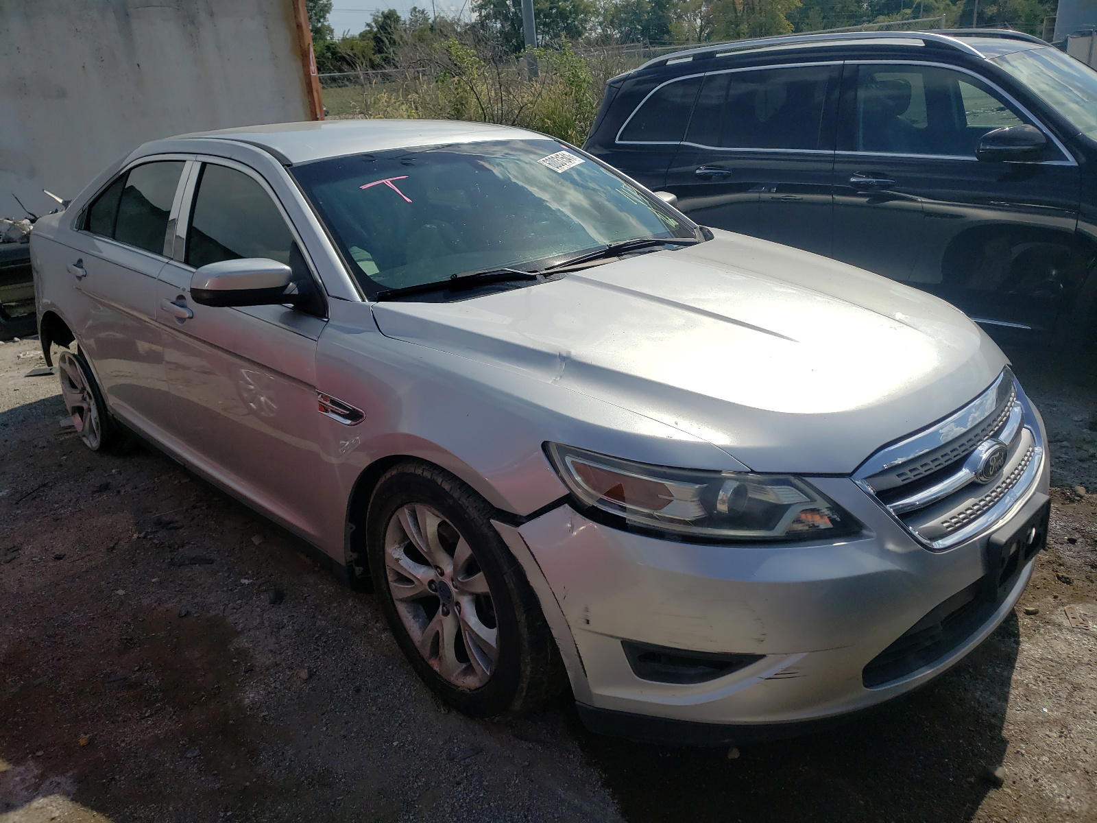 FORD TAURUS SEL 2010 with VIN 1FAHP2EW9AG112074 - Photo from auction
