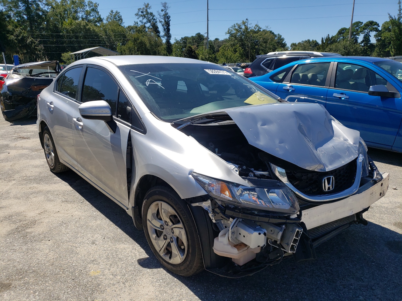 HONDA CIVIC LX 2014 with VIN 19XFB2F56EE049690 - Photo from auction