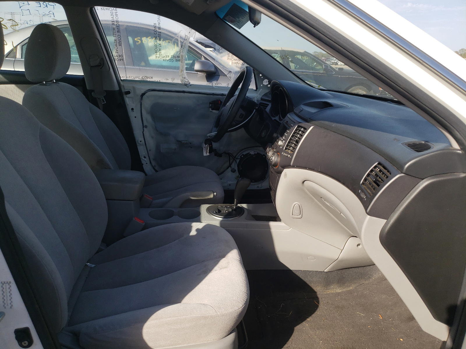 Photo 5 from auction – 2009 KIA OPTIMA LX with VIN KNAGE228295356848