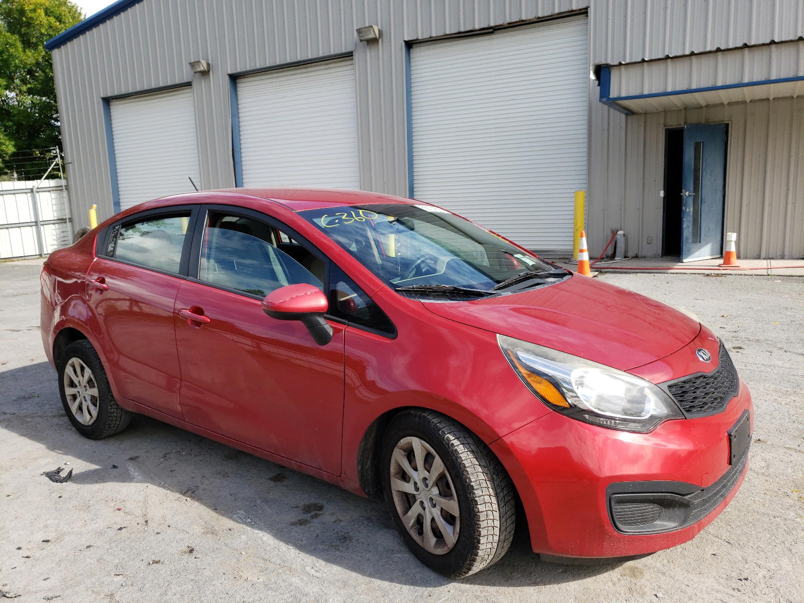 KIA RIO LX 2014 with VIN KNADM4A32E6386315 - Photo from auction