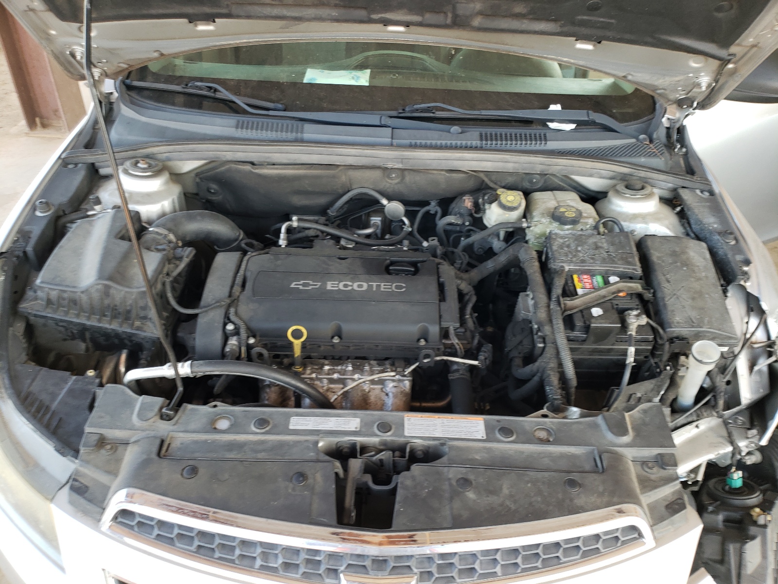 Photo 7 from auction – 2012 CHEVROLET CRUZE with VIN 1G1PC5SH3C7270401