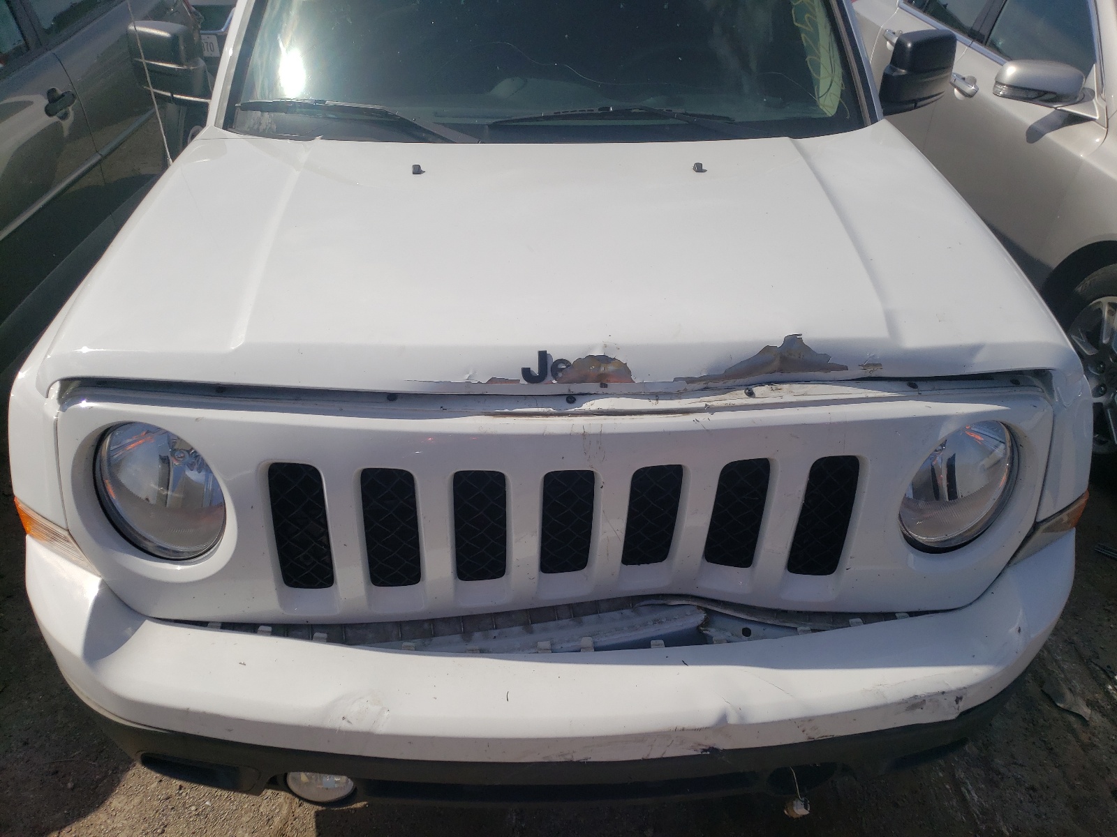 Photo 7 from auction – 2014 JEEP PATRIOT SP with VIN 1C4NJPBA2ED812689