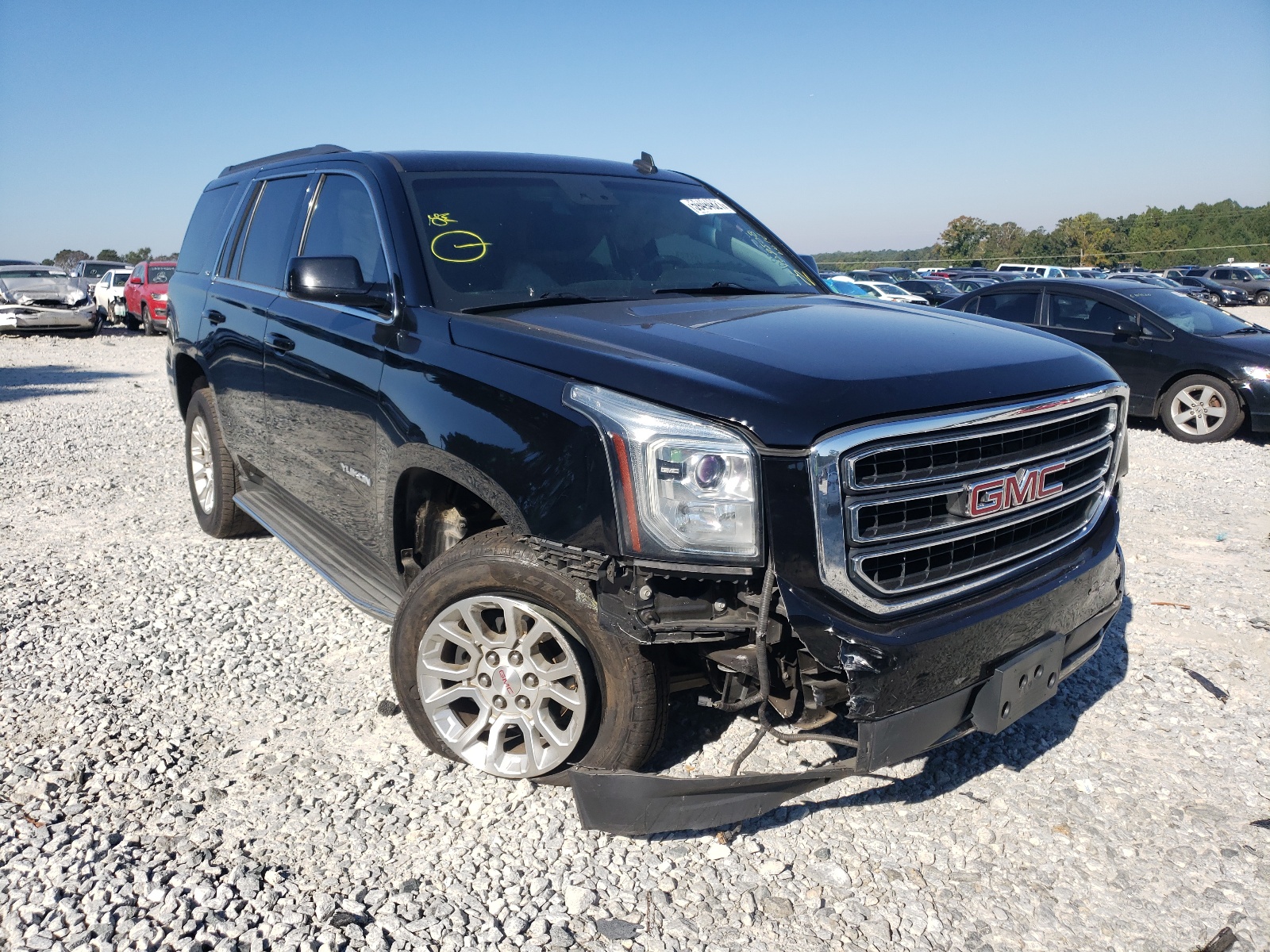 GMC YUKON SLT 2015 with VIN 1GKS2BKC4FR233779 - Photo from auction