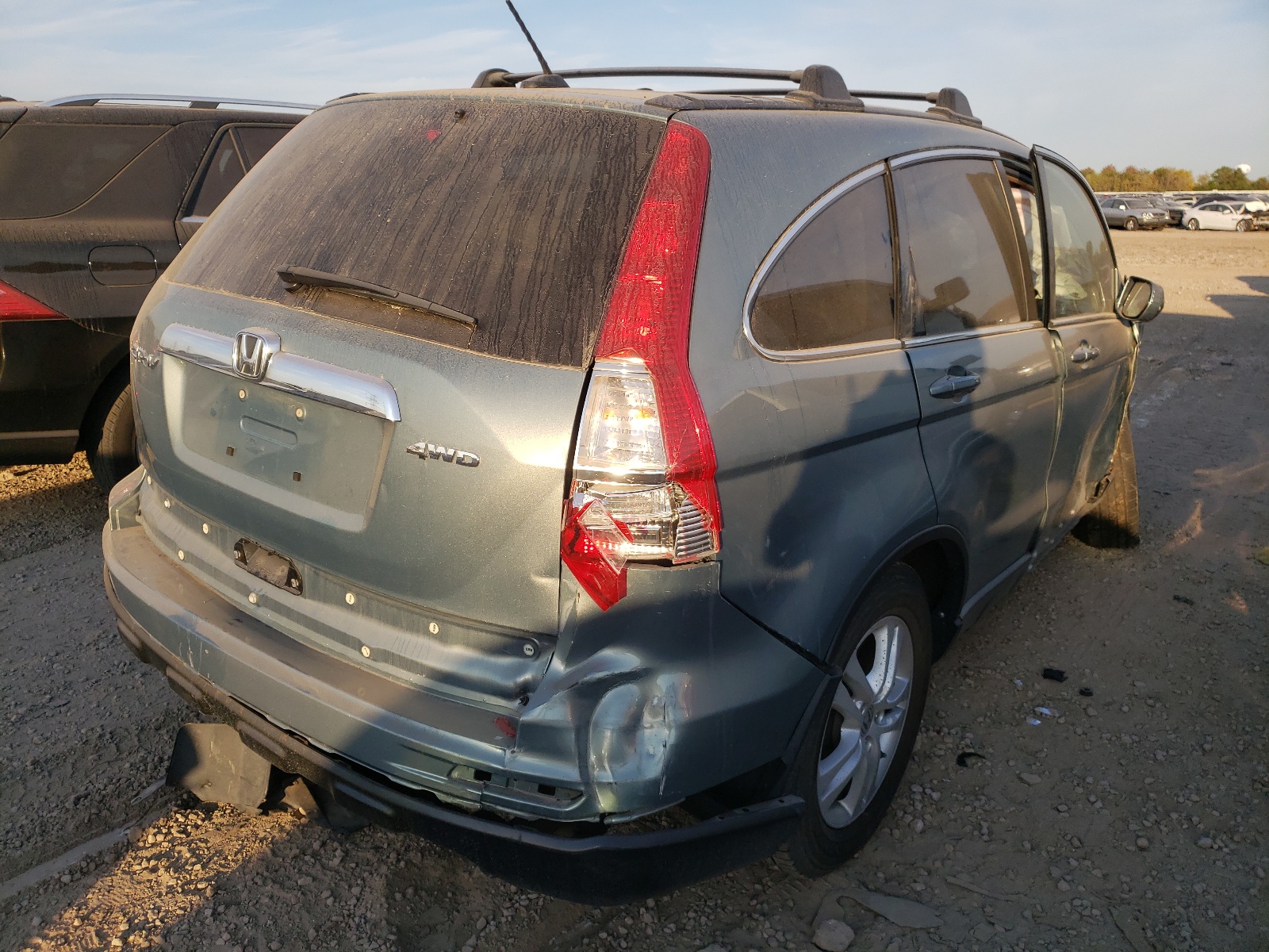 Photo 4 from auction – 2011 HONDA CR-V EXL with VIN 5J6RE4H72BL108665