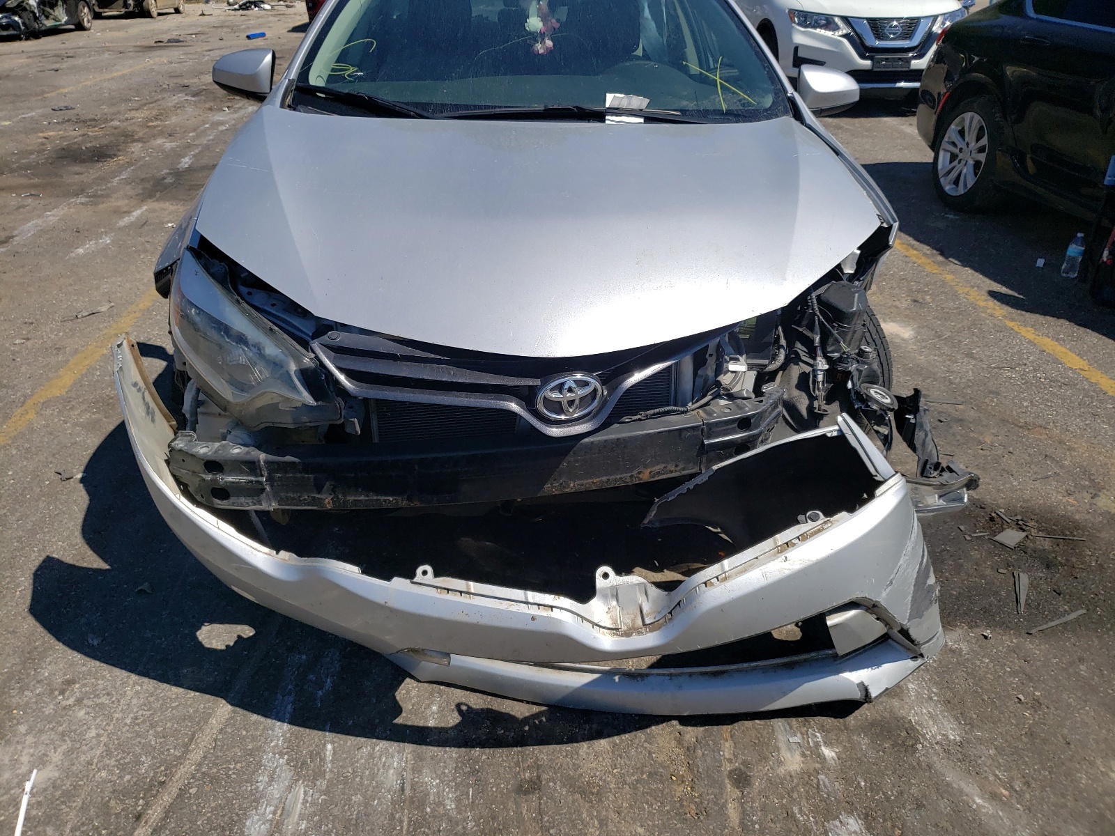 Photo 9 from auction – 2016 TOYOTA COROLLA L with VIN 5YFBURHEXGP543289