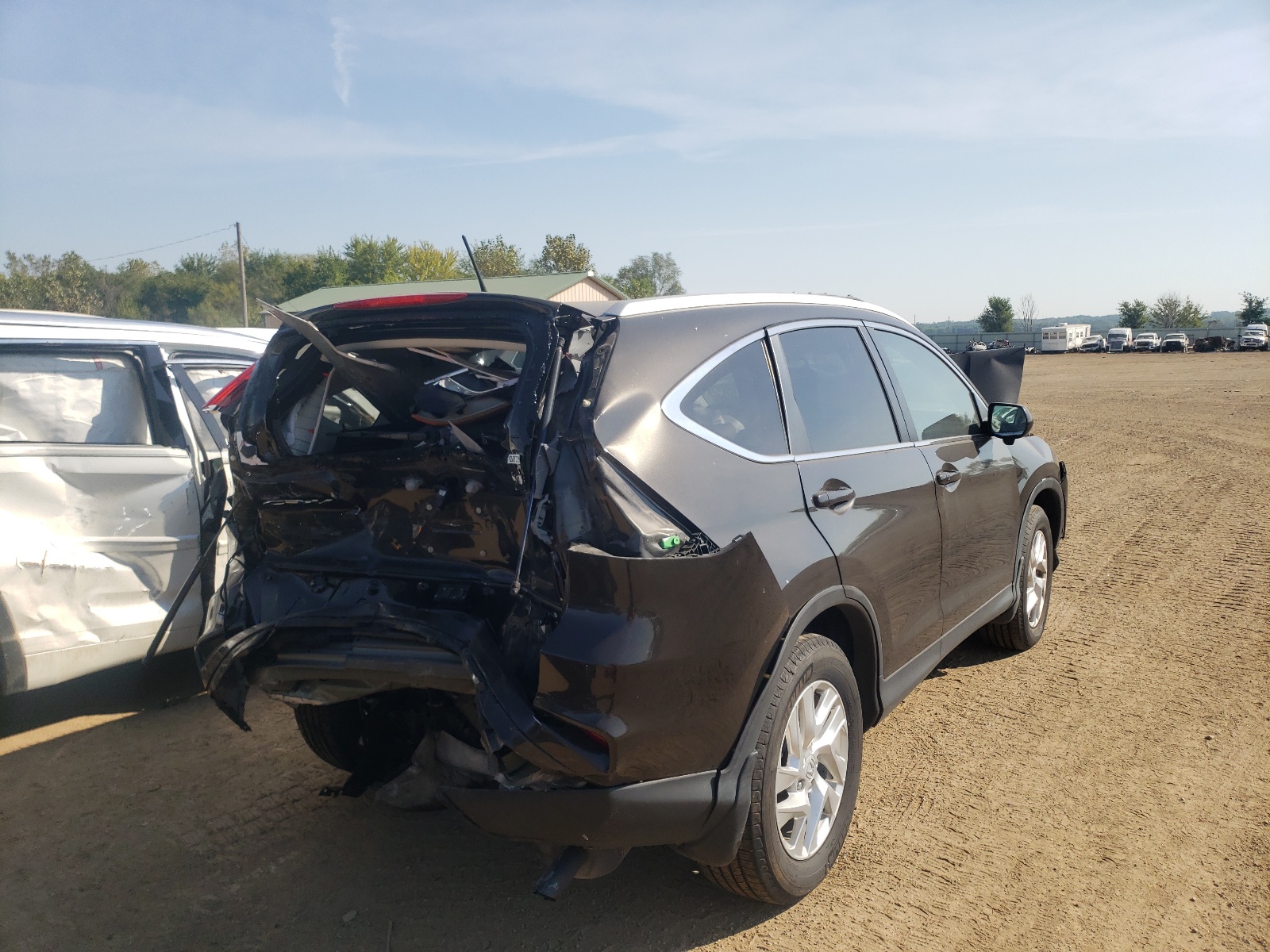 Photo 4 from auction – 2015 HONDA CR-V EXL with VIN 5J6RM4H7XFL065413