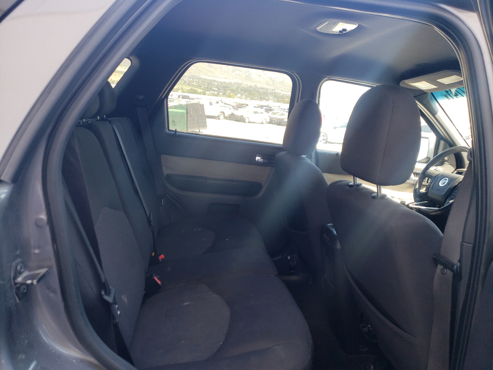 Photo 6 from auction – 2009 MERCURY MARINER with VIN 4M2CU81G89KJ19793