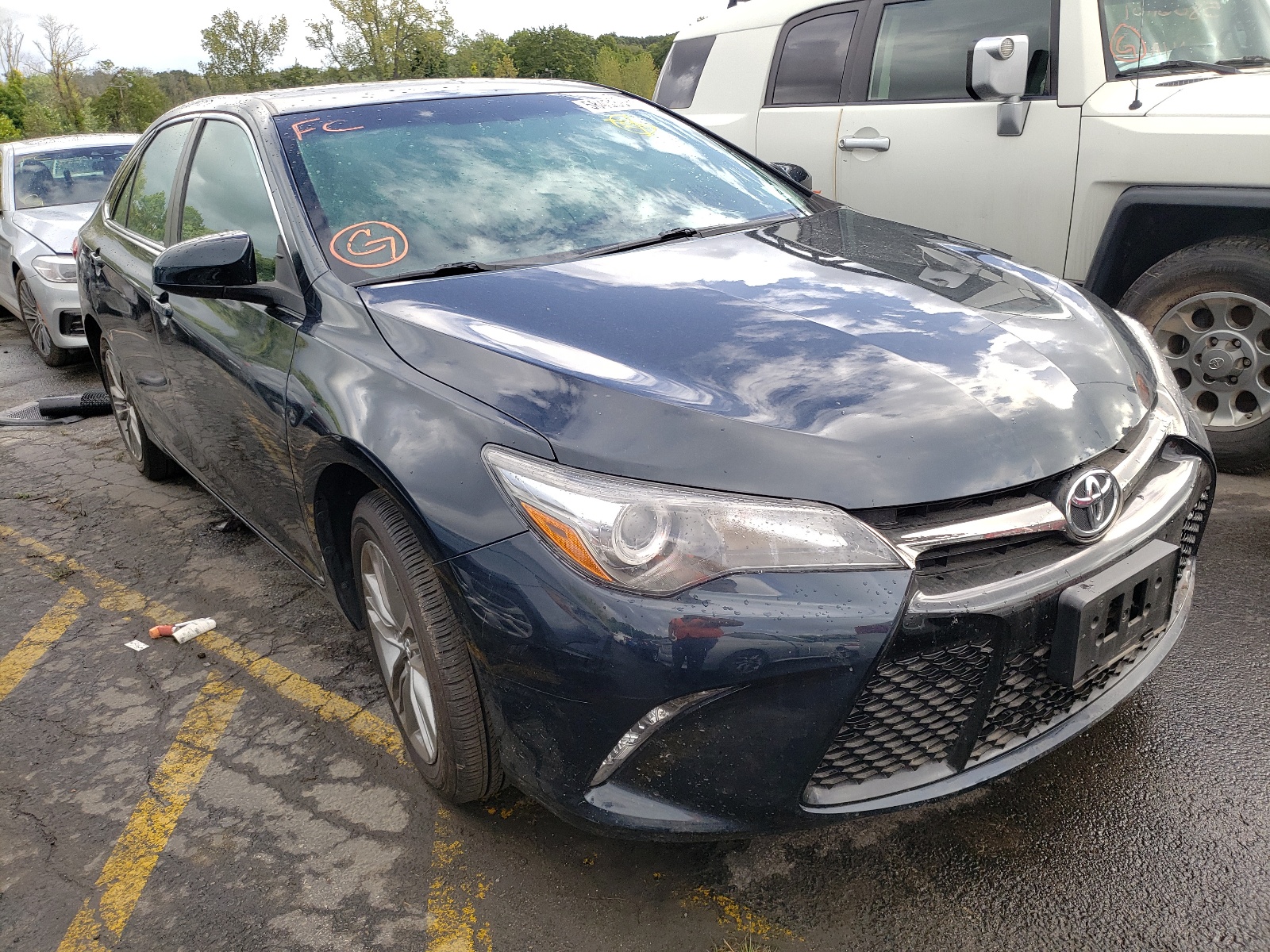TOYOTA CAMRY LE 2017 with VIN 4T1BF1FK3HU809093 - Photo from auction