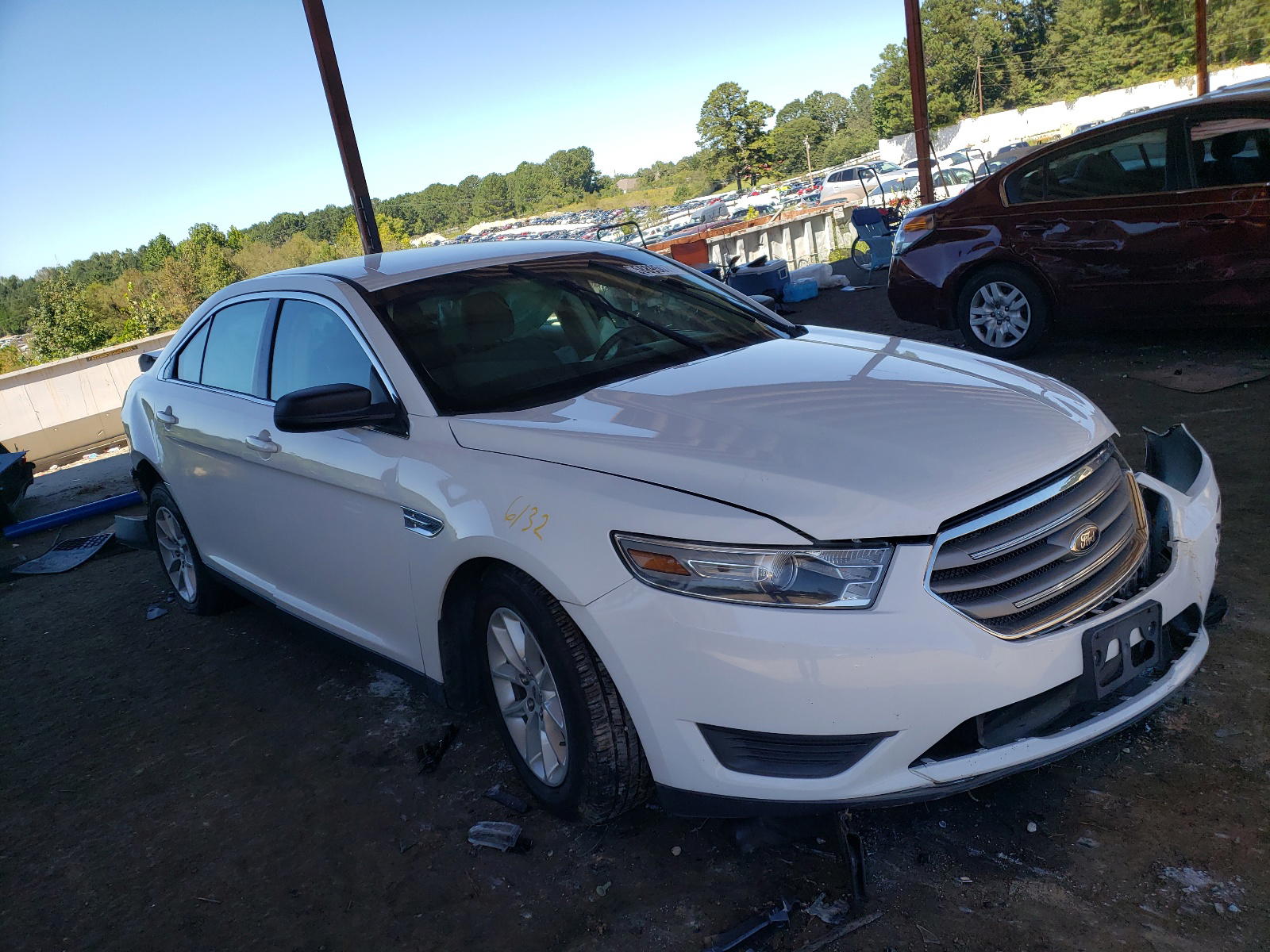 FORD TAURUS SE 2013 with VIN 1FAHP2D86DG208378 - Photo from auction