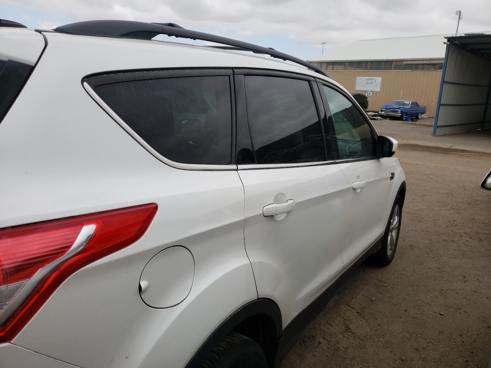 Photo 4 from auction – 2013 FORD ESCAPE SE with VIN 1FMCU0G95DUD63930