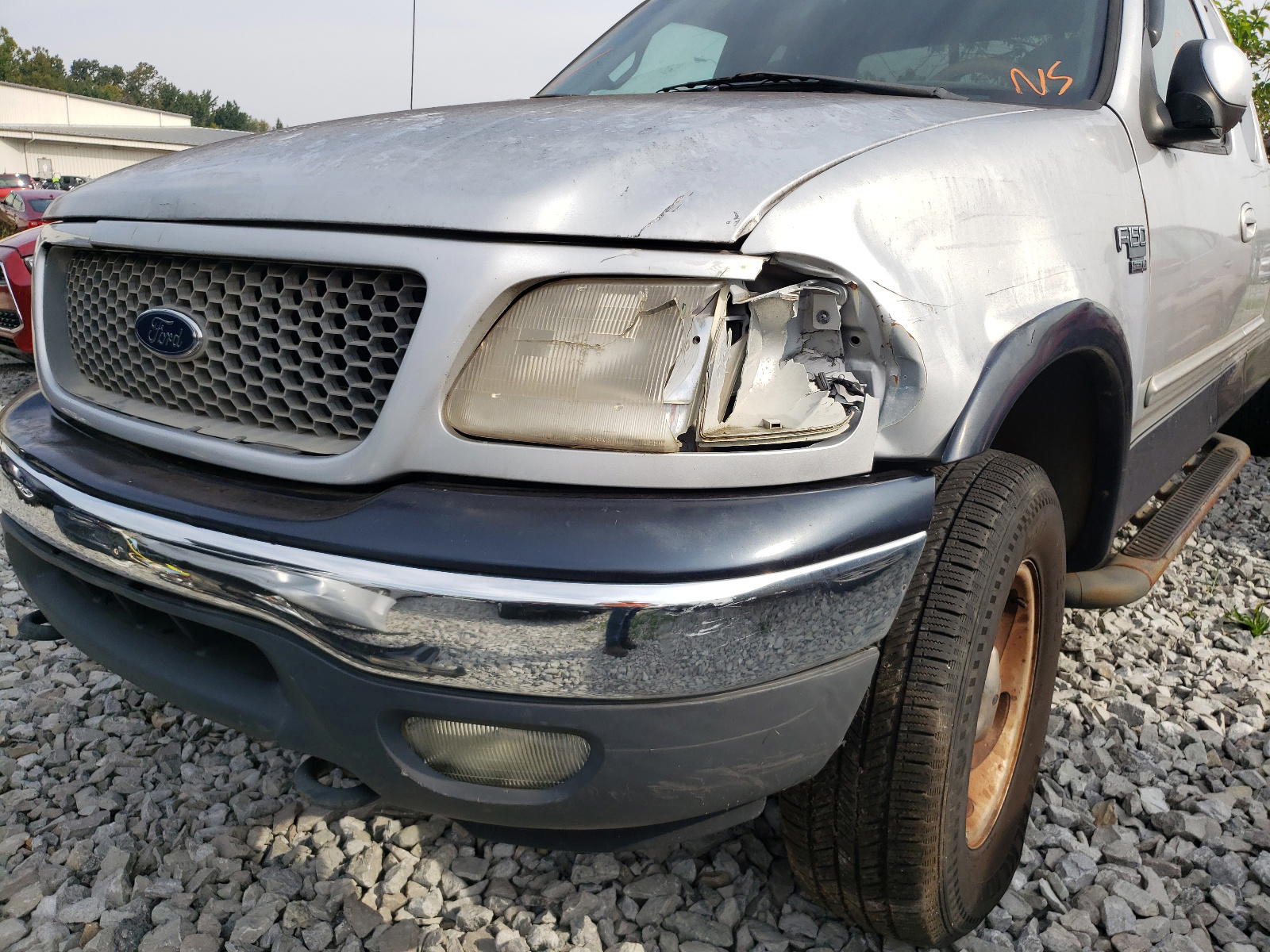 Photo 9 from auction – 2000 FORD F-150 with VIN 1FTRX18LXYNA91073