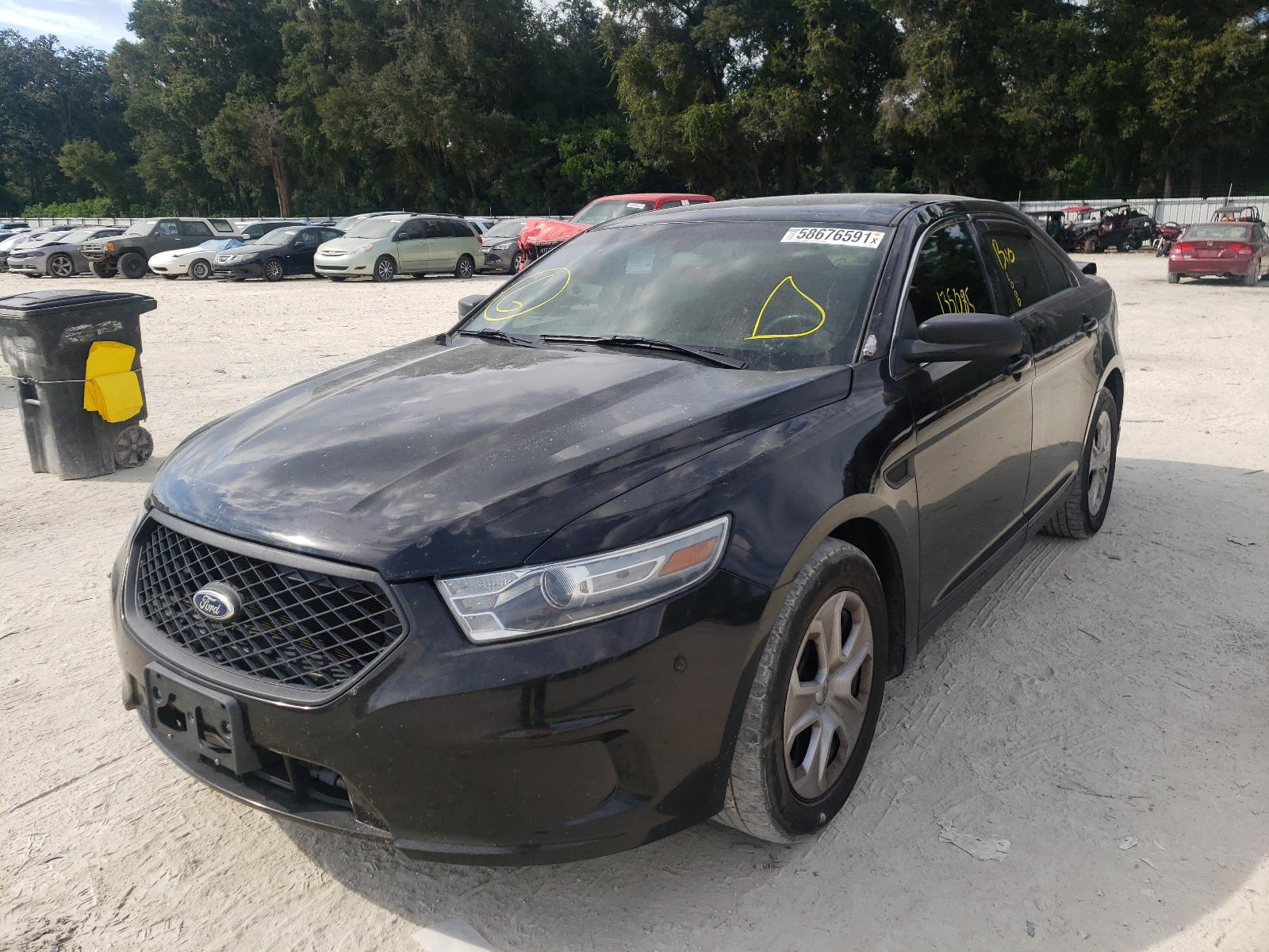 Photo 2 from auction – 2013 FORD TAURUS POL with VIN 1FAHP2M85DG110474