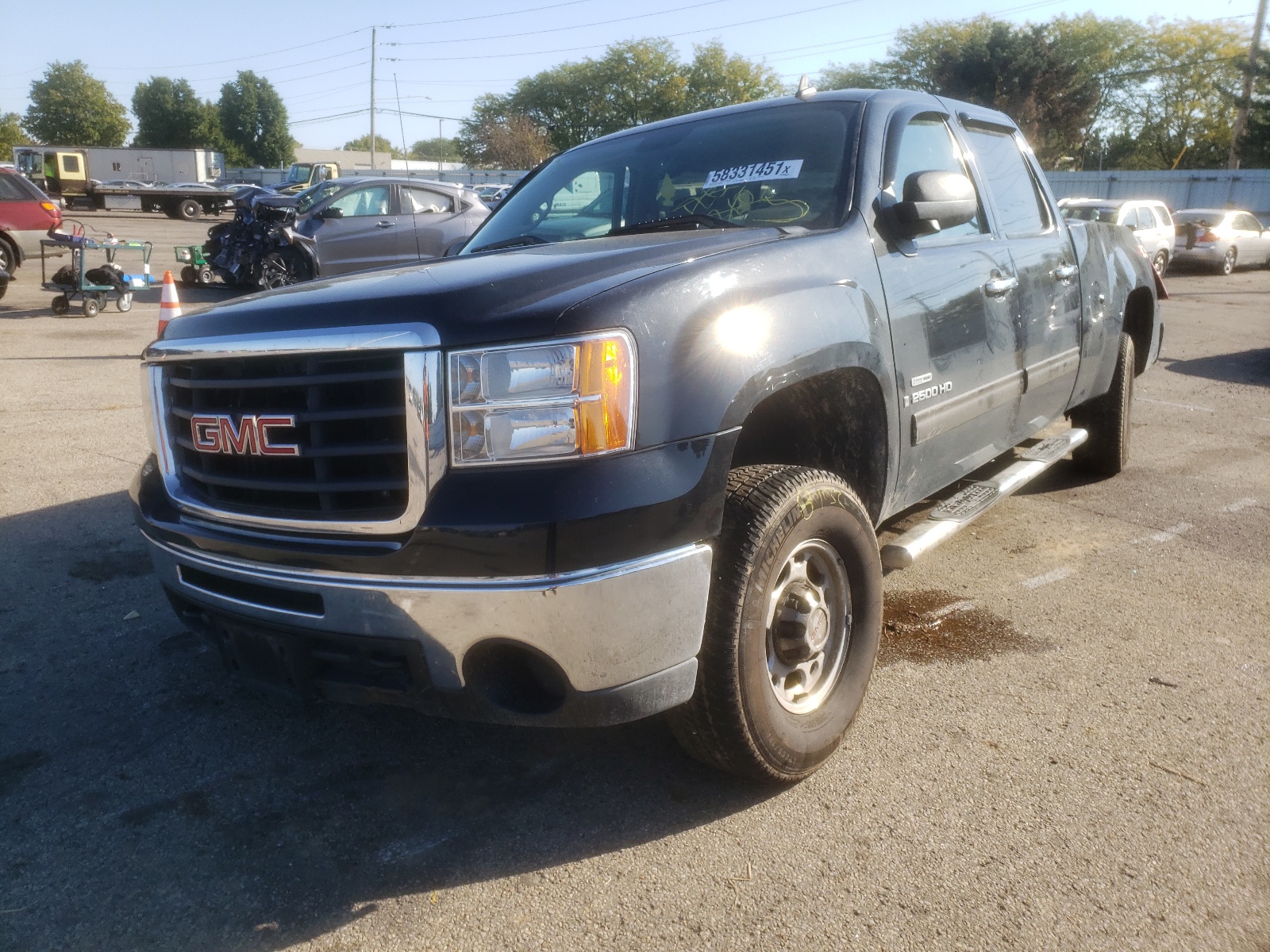 Photo 2 from auction – 2009 GMC SIERRA K25 with VIN 1GTHK53619F131894