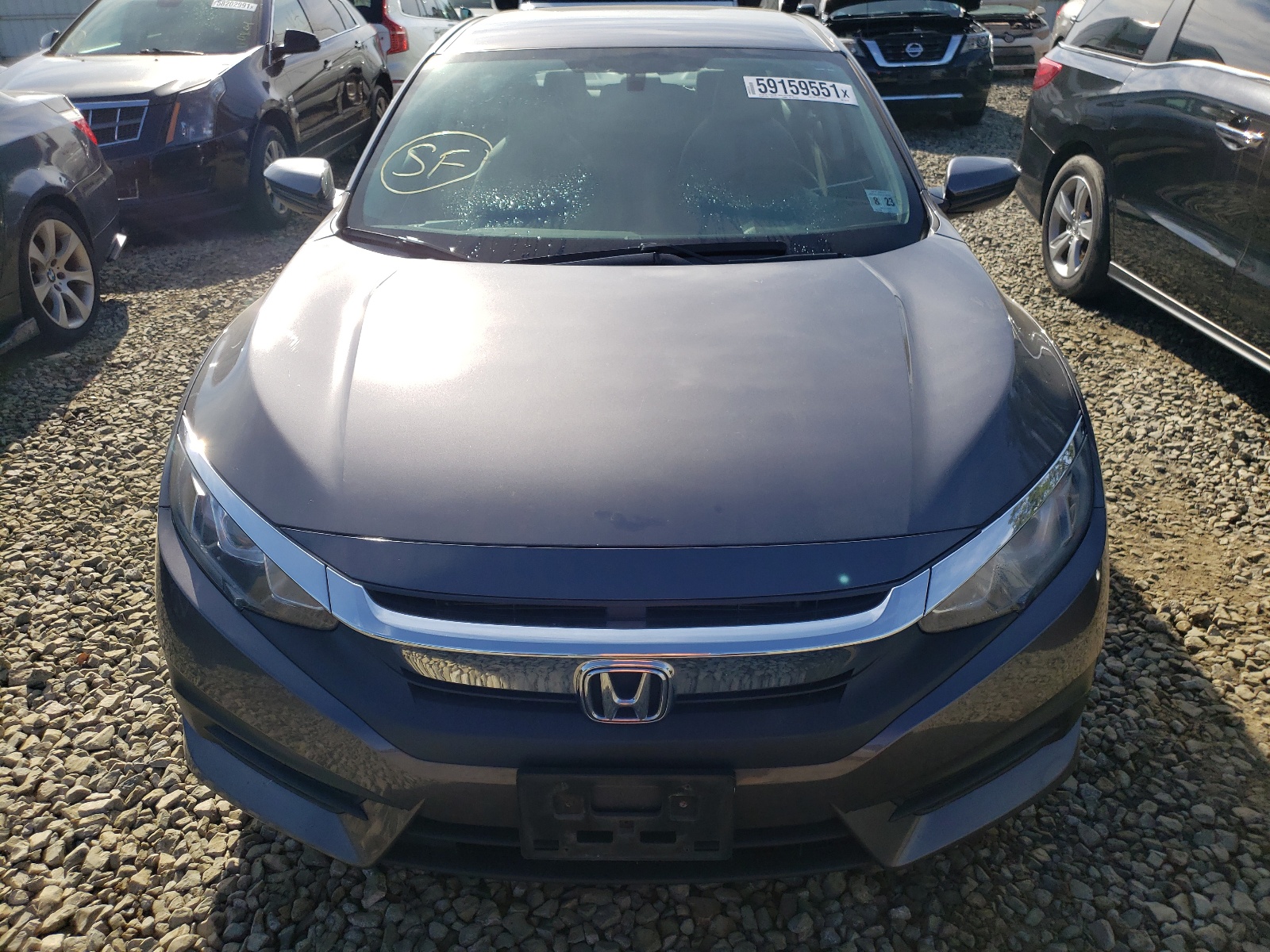 Photo 9 from auction – 2018 HONDA CIVIC LX with VIN 2HGFC2F55JH563740