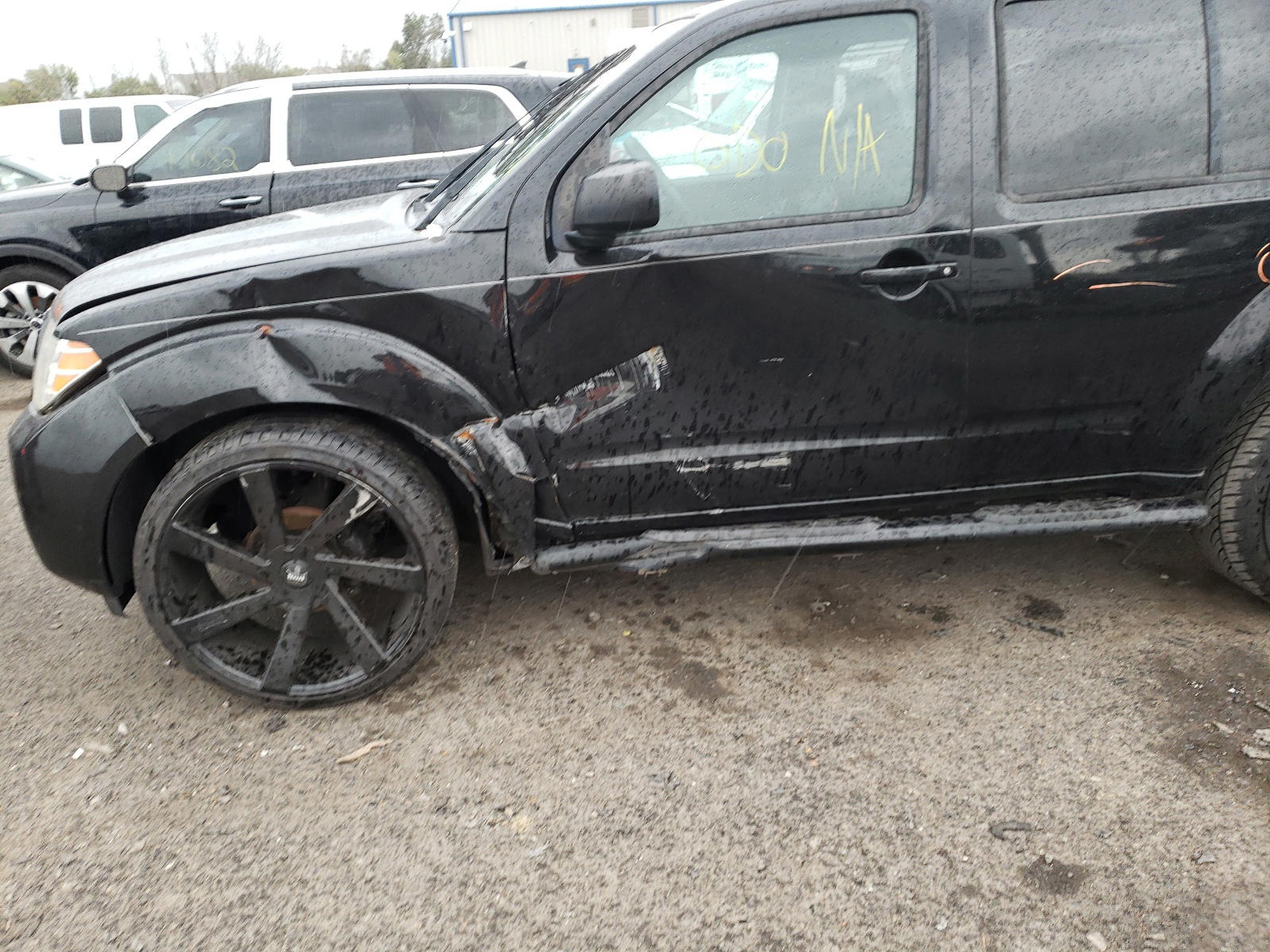 Photo 9 from auction – 2011 NISSAN PATHFINDER with VIN 5N1AR1NB7BC620559