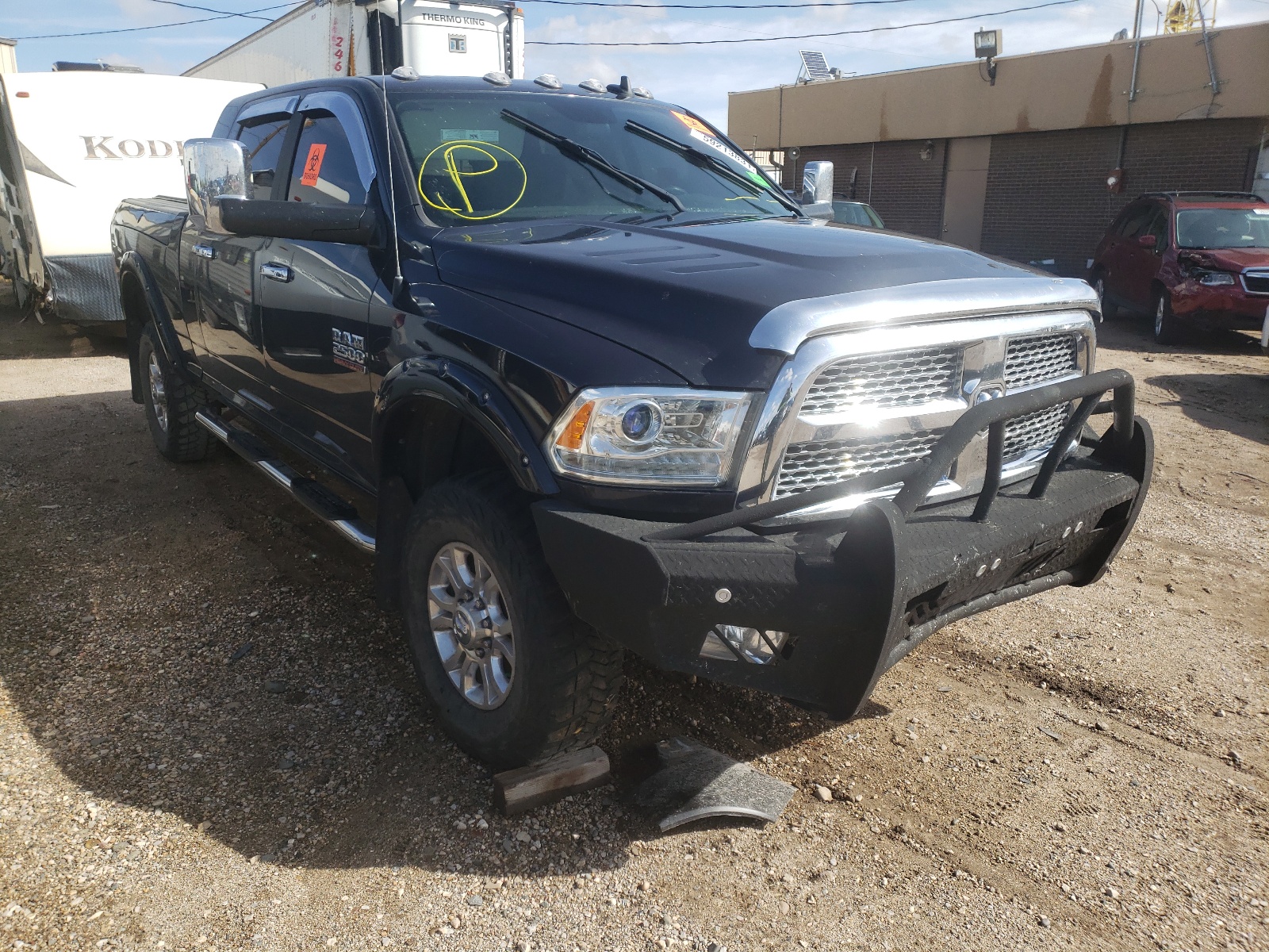 RAM 2500 LARAM 2018 with VIN 3C6UR5NL0JG371557 - Photo from auction